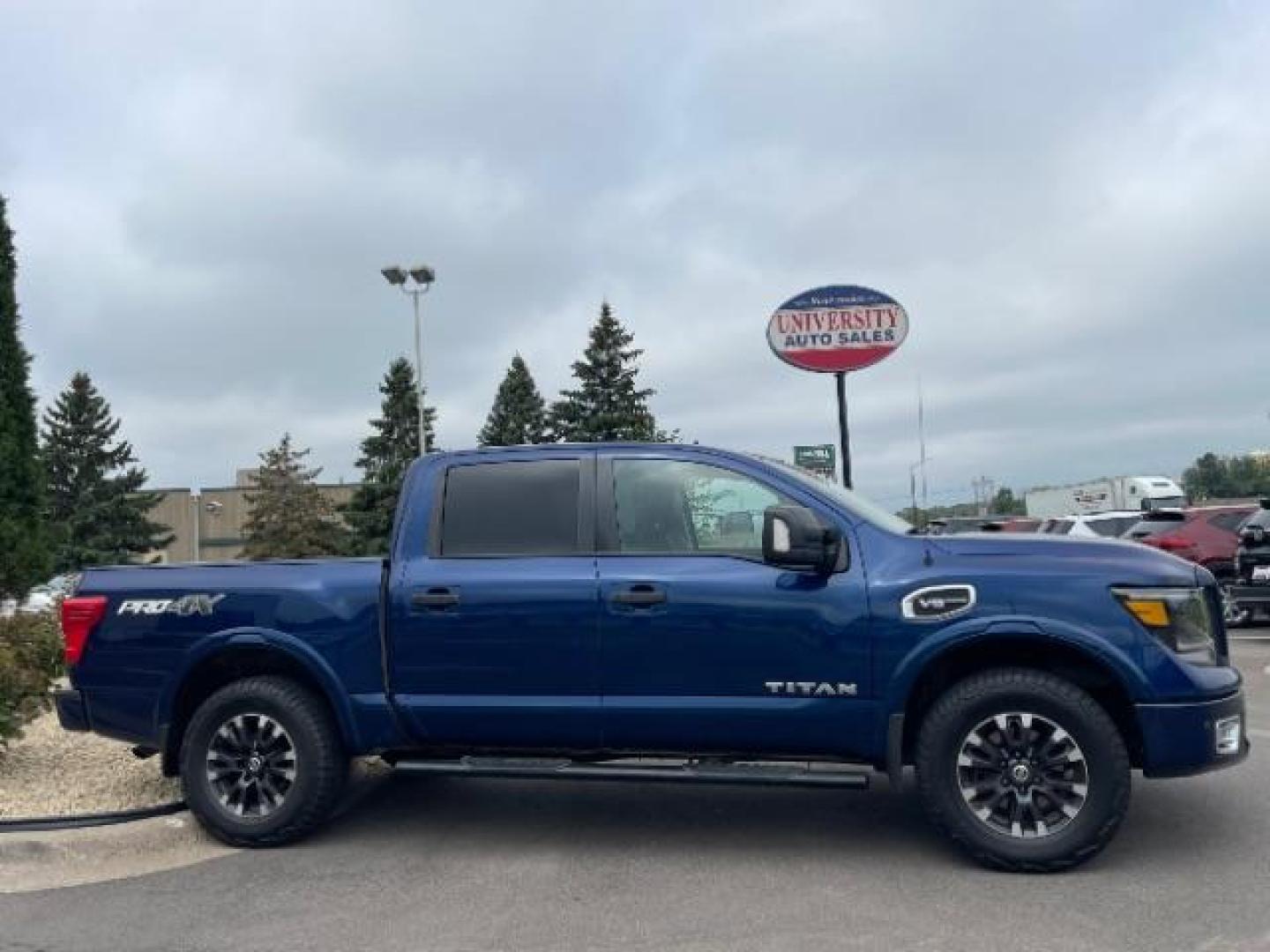 2017 Deep Blue Pearl Nissan Titan PRO-4X Crew Cab 4WD (1N6AA1E58HN) with an 5.6L V8 DOHC 32V engine, 6-Speed Automatic transmission, located at 745 S Robert St, St. Paul, MN, 55107, (651) 222-2991, 44.923389, -93.081215 - Photo#3