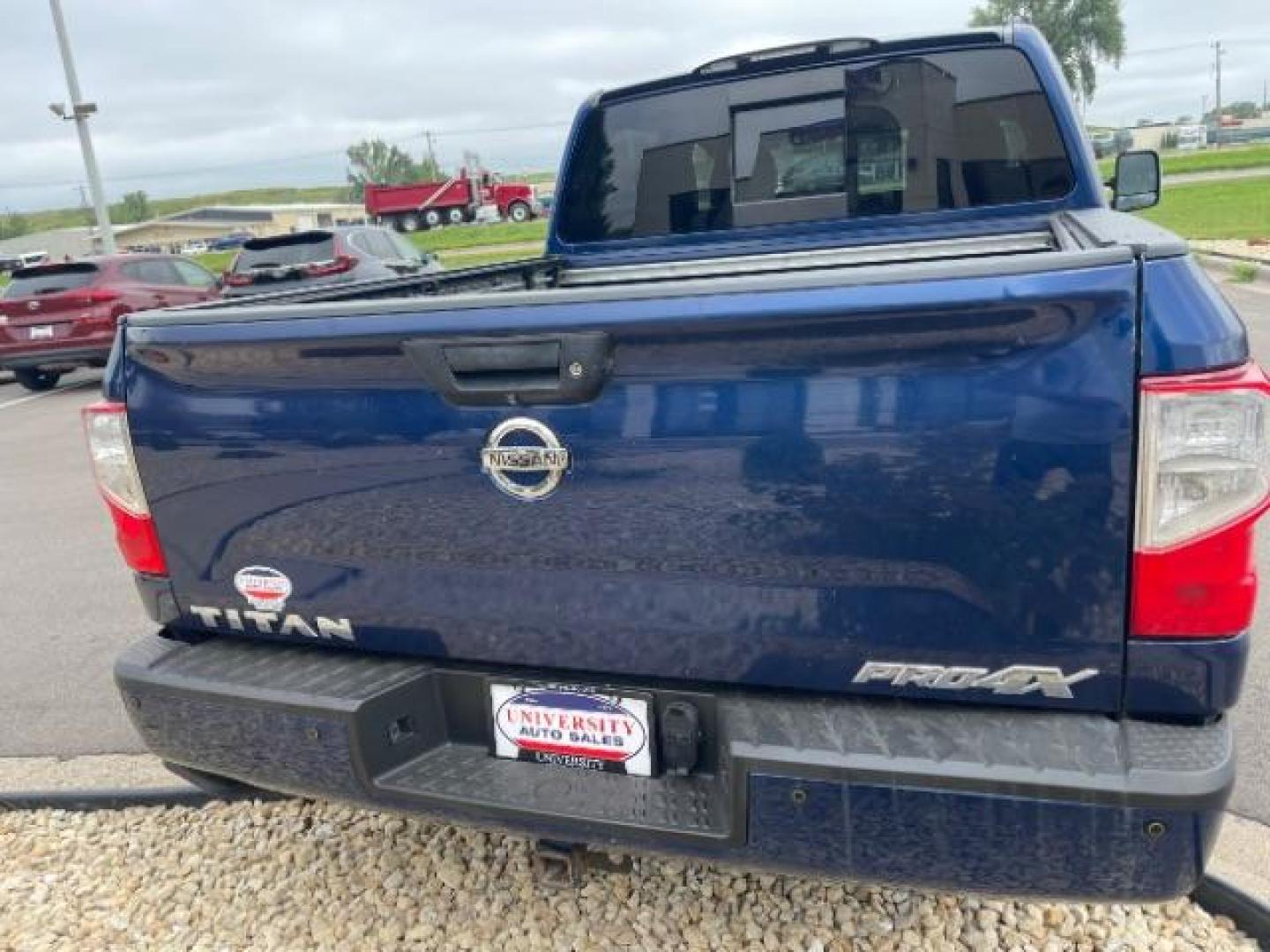 2017 Deep Blue Pearl Nissan Titan PRO-4X Crew Cab 4WD (1N6AA1E58HN) with an 5.6L V8 DOHC 32V engine, 6-Speed Automatic transmission, located at 745 S Robert St, St. Paul, MN, 55107, (651) 222-2991, 44.923389, -93.081215 - Photo#5