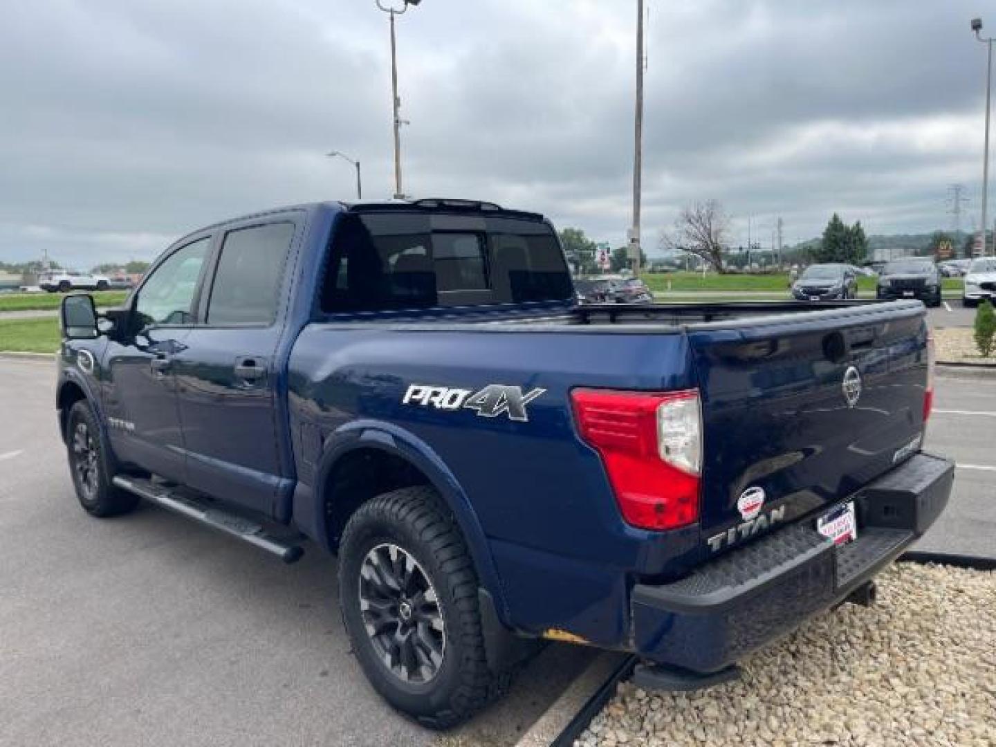 2017 Deep Blue Pearl Nissan Titan PRO-4X Crew Cab 4WD (1N6AA1E58HN) with an 5.6L V8 DOHC 32V engine, 6-Speed Automatic transmission, located at 745 S Robert St, St. Paul, MN, 55107, (651) 222-2991, 44.923389, -93.081215 - Photo#7