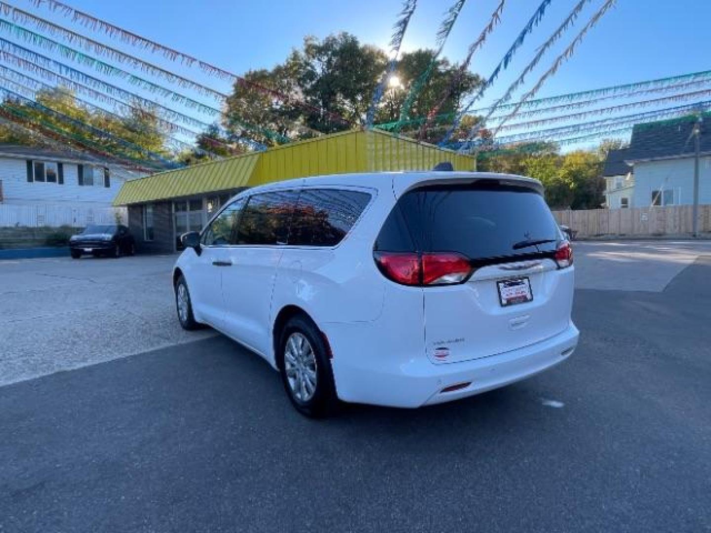 2020 Bright White Clear Coat Chrysler Voyager L (2C4RC1AGXLR) with an 3.6L V6 DOHC 24V engine, 9-Speed Automatic transmission, located at 745 S Robert St, St. Paul, MN, 55107, (651) 222-2991, 44.923389, -93.081215 - Photo#1