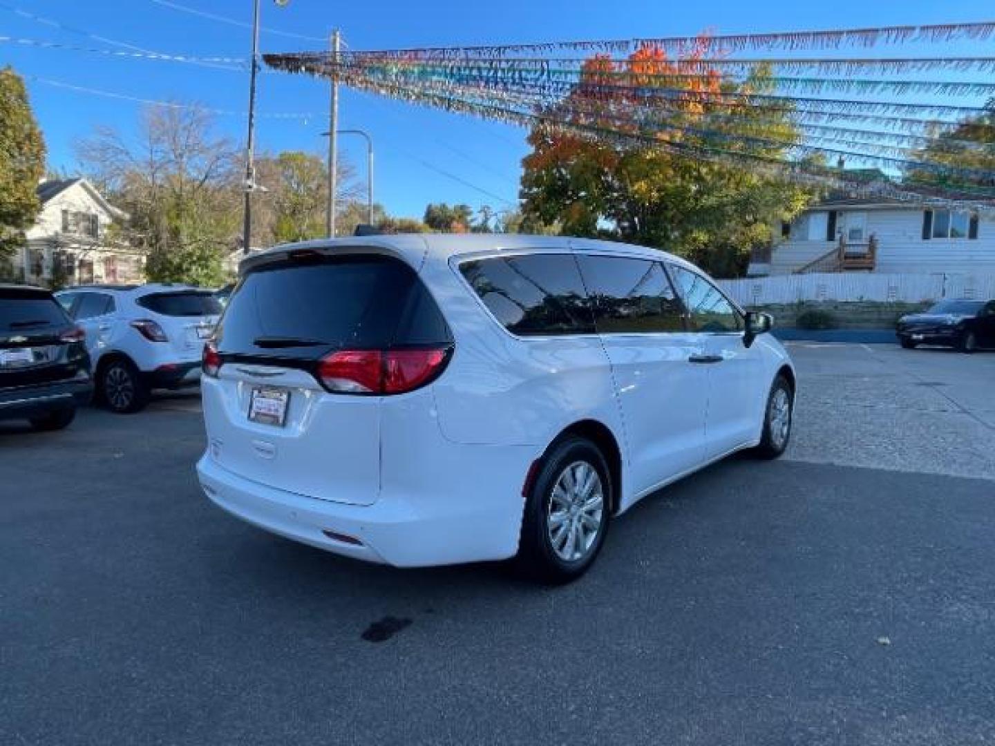 2020 Bright White Clear Coat Chrysler Voyager L (2C4RC1AGXLR) with an 3.6L V6 DOHC 24V engine, 9-Speed Automatic transmission, located at 745 S Robert St, St. Paul, MN, 55107, (651) 222-2991, 44.923389, -93.081215 - Photo#2