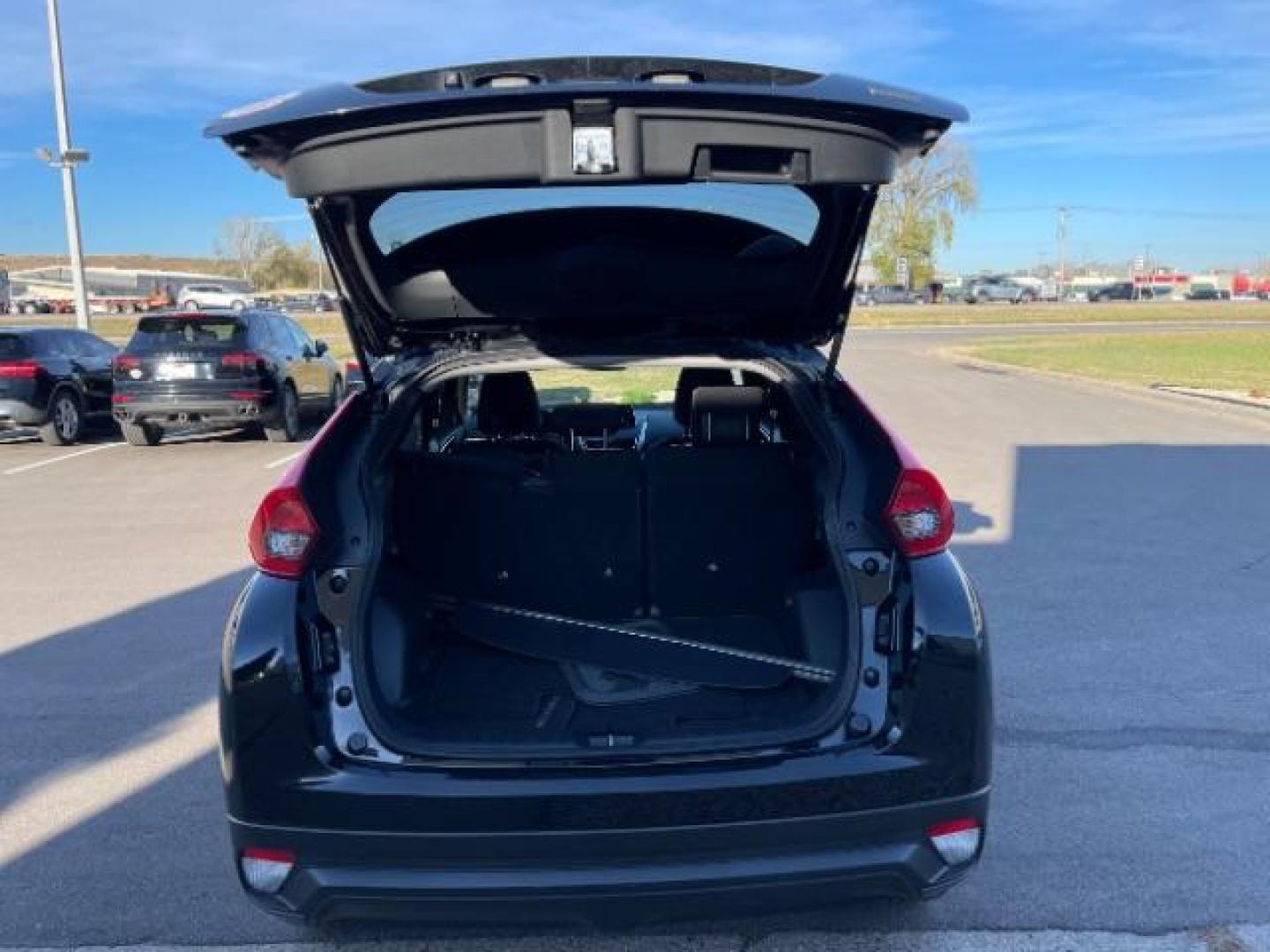 2020 Tarmac Black Metallic Mitsubishi Eclipse Cross LE AWD (JA4AT4AA0LZ) with an 1.5L L4 DOHC 16V engine, Continuously Variable Transmission transmission, located at 3301 W Hwy 13, Burnsville, MN, 55337, (952) 460-3200, 44.775333, -93.320808 - Photo#5