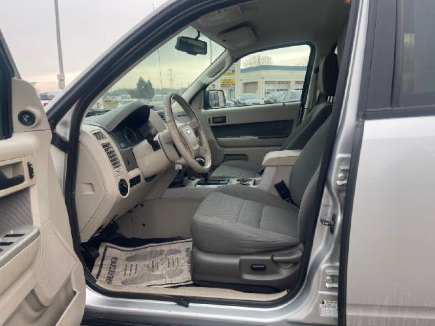 2009 Brilliant Silver Metallic Ford Escape Hybrid 4WD (1FMCU59319K) with an 2.3L L4 DOHC 16V HYBRID engine, Continuously Variable Transmission transmission, located at 3301 W Hwy 13, Burnsville, MN, 55337, (952) 460-3200, 44.775333, -93.320808 - Photo#19