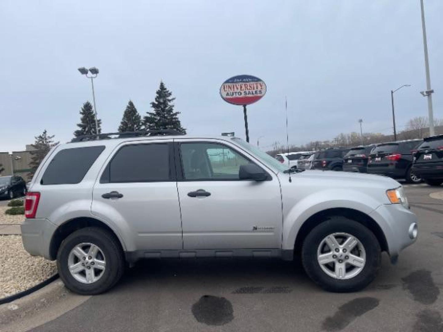 2009 Brilliant Silver Metallic Ford Escape Hybrid 4WD (1FMCU59319K) with an 2.3L L4 DOHC 16V HYBRID engine, Continuously Variable Transmission transmission, located at 3301 W Hwy 13, Burnsville, MN, 55337, (952) 460-3200, 44.775333, -93.320808 - Photo#2