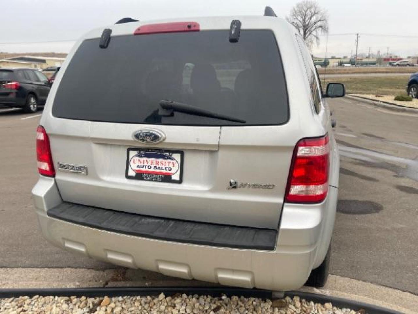 2009 Brilliant Silver Metallic Ford Escape Hybrid 4WD (1FMCU59319K) with an 2.3L L4 DOHC 16V HYBRID engine, Continuously Variable Transmission transmission, located at 3301 W Hwy 13, Burnsville, MN, 55337, (952) 460-3200, 44.775333, -93.320808 - Photo#5