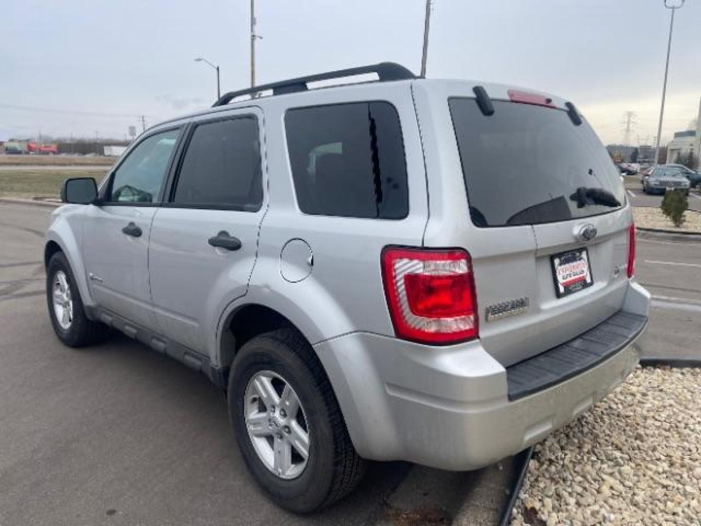 2009 Brilliant Silver Metallic Ford Escape Hybrid 4WD (1FMCU59319K) with an 2.3L L4 DOHC 16V HYBRID engine, Continuously Variable Transmission transmission, located at 3301 W Hwy 13, Burnsville, MN, 55337, (952) 460-3200, 44.775333, -93.320808 - Photo#6