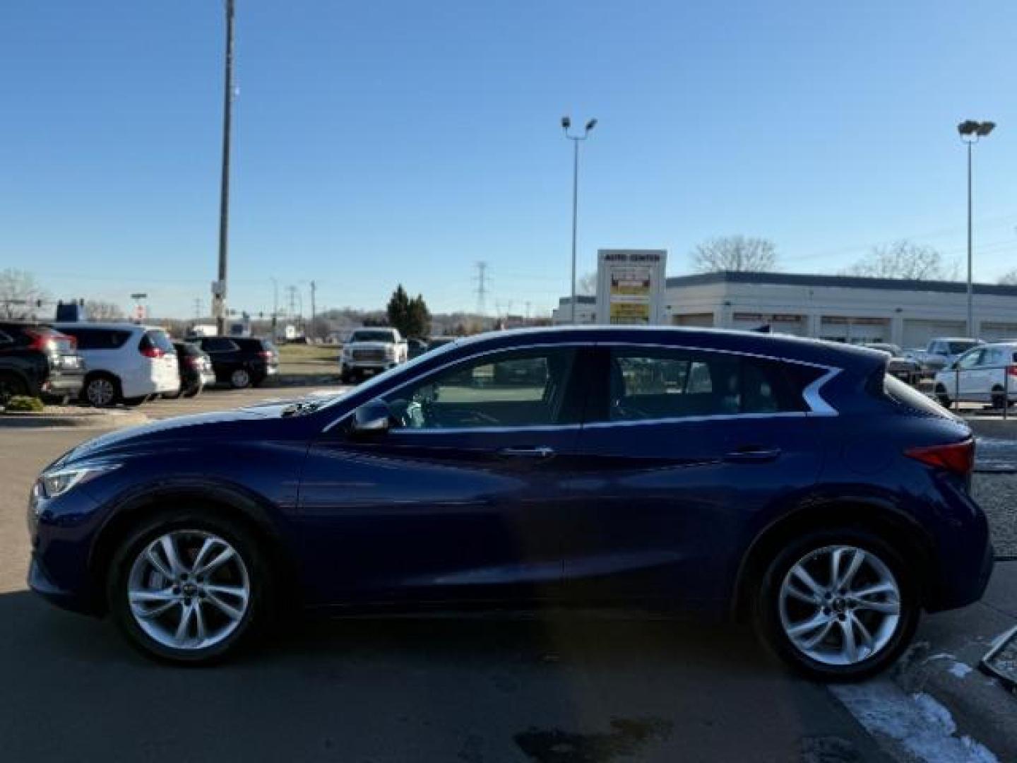 2018 Ink Blue Infiniti QX30 Base (SJKCH5CP4JA) with an 2.0L L4 DOHC 16V engine, 7-Speed Automatic transmission, located at 3301 W Hwy 13, Burnsville, MN, 55337, (952) 460-3200, 44.775333, -93.320808 - Photo#6