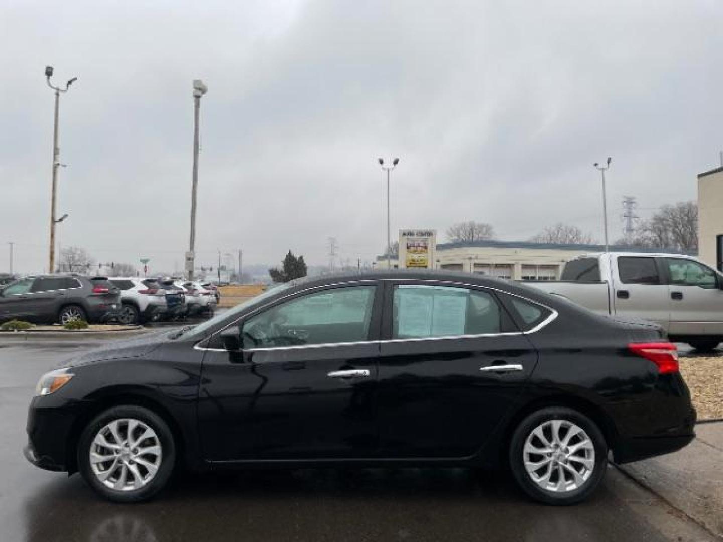 2019 Super Black Nissan Sentra SV (3N1AB7APXKL) with an 1.8L I-4 DOHC engine, located at 3301 W Hwy 13, Burnsville, MN, 55337, (952) 460-3200, 44.775333, -93.320808 - Photo#3