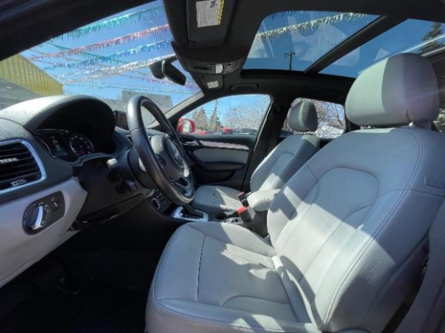 2018 Misano Red Pearl Effect Audi Q3 2.0T Premium (WA1JCCFSXJR) with an 2L I-4 gasoline direct injection engine, located at 745 S Robert St, St. Paul, MN, 55107, (651) 222-2991, 44.923389, -93.081215 - Photo#13