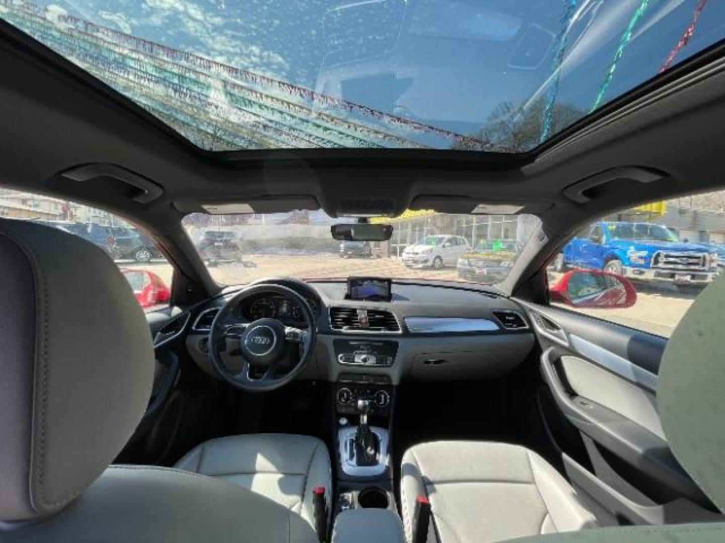 2018 Misano Red Pearl Effect Audi Q3 2.0T Premium (WA1JCCFSXJR) with an 2L I-4 gasoline direct injection engine, located at 745 S Robert St, St. Paul, MN, 55107, (651) 222-2991, 44.923389, -93.081215 - Photo#14