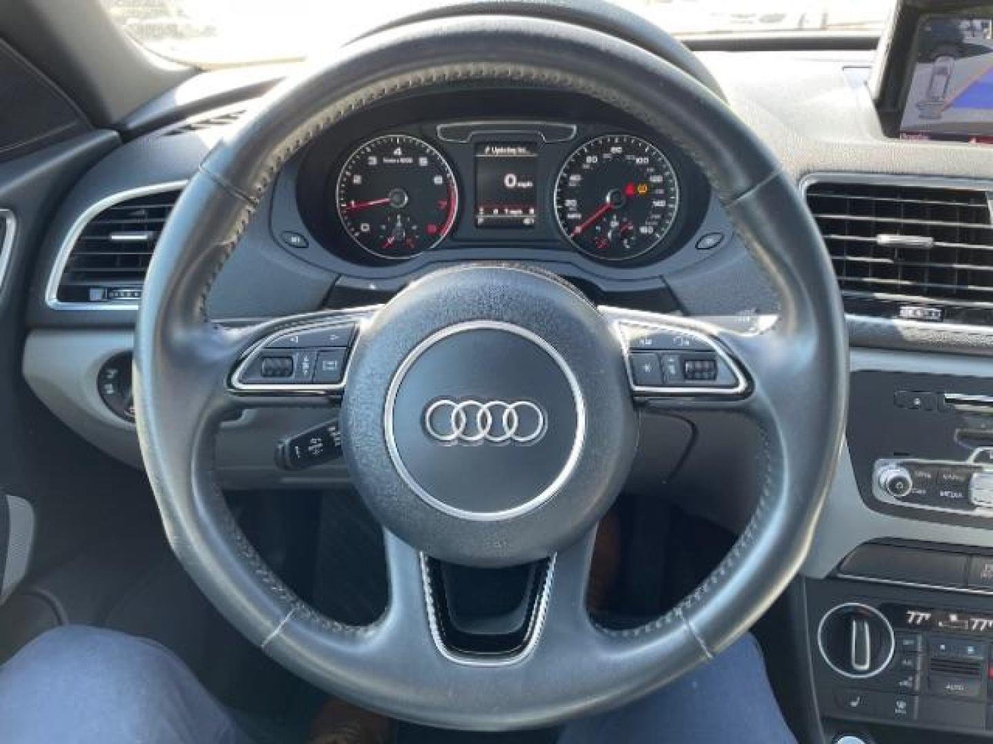 2018 Misano Red Pearl Effect Audi Q3 2.0T Premium (WA1JCCFSXJR) with an 2L I-4 gasoline direct injection engine, located at 745 S Robert St, St. Paul, MN, 55107, (651) 222-2991, 44.923389, -93.081215 - Photo#16
