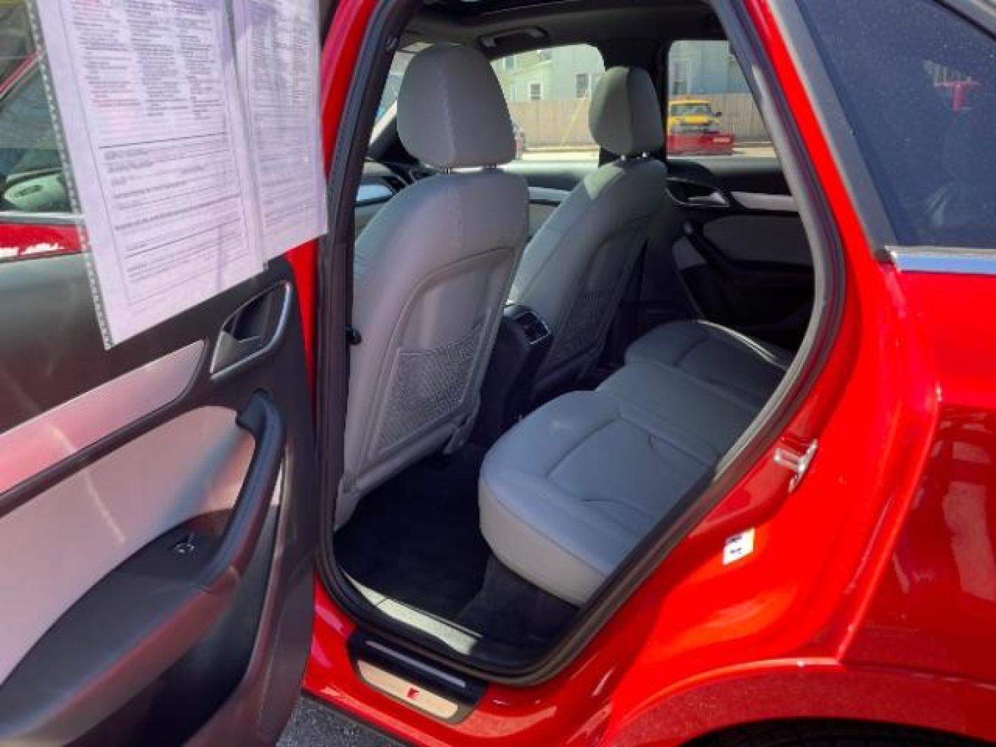 2018 Misano Red Pearl Effect Audi Q3 2.0T Premium (WA1JCCFSXJR) with an 2L I-4 gasoline direct injection engine, located at 745 S Robert St, St. Paul, MN, 55107, (651) 222-2991, 44.923389, -93.081215 - Photo#19