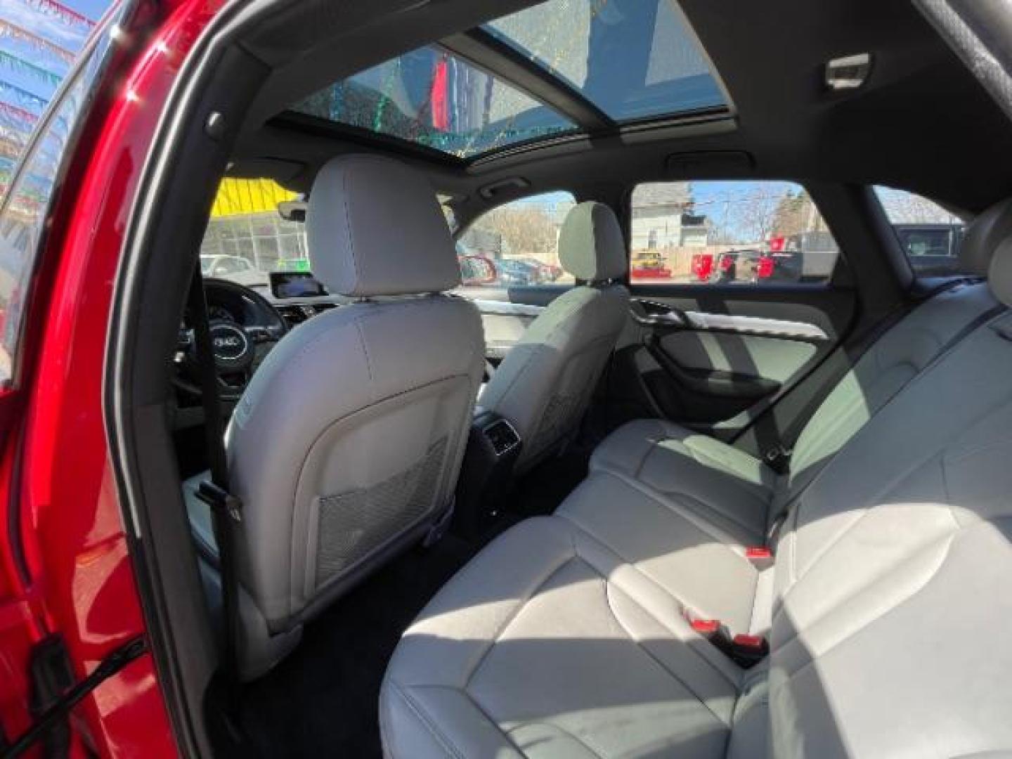 2018 Misano Red Pearl Effect Audi Q3 2.0T Premium (WA1JCCFSXJR) with an 2L I-4 gasoline direct injection engine, located at 745 S Robert St, St. Paul, MN, 55107, (651) 222-2991, 44.923389, -93.081215 - Photo#20