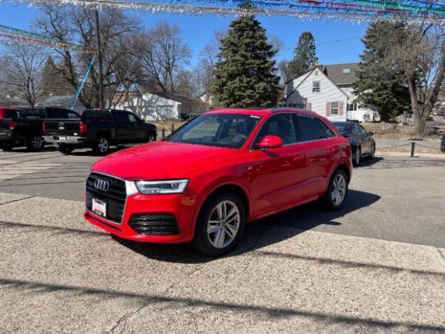 2018 Misano Red Pearl Effect Audi Q3 2.0T Premium (WA1JCCFSXJR) with an 2L I-4 gasoline direct injection engine, located at 745 S Robert St, St. Paul, MN, 55107, (651) 222-2991, 44.923389, -93.081215 - Photo#0