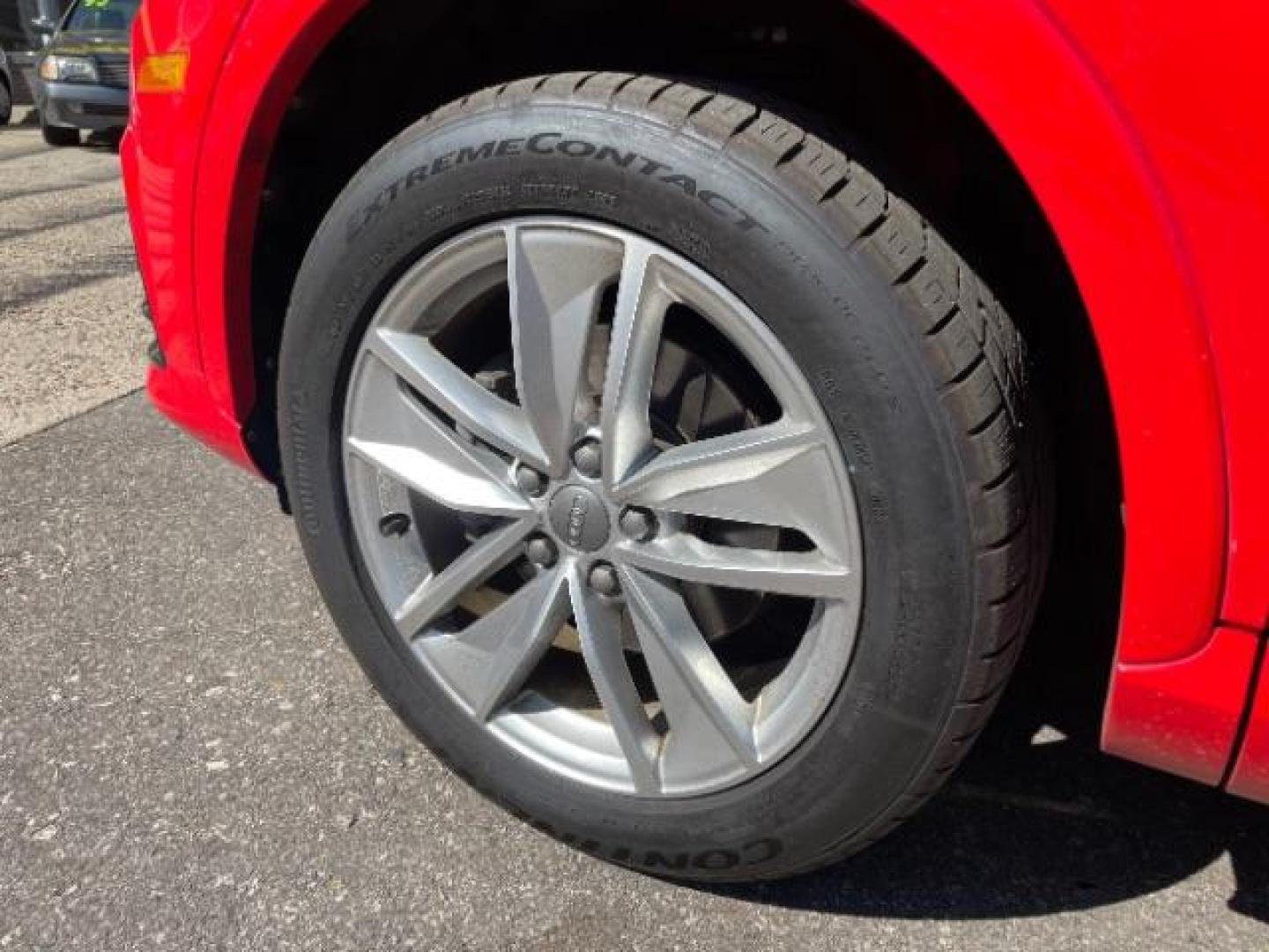 2018 Misano Red Pearl Effect Audi Q3 2.0T Premium (WA1JCCFSXJR) with an 2L I-4 gasoline direct injection engine, located at 745 S Robert St, St. Paul, MN, 55107, (651) 222-2991, 44.923389, -93.081215 - Photo#1