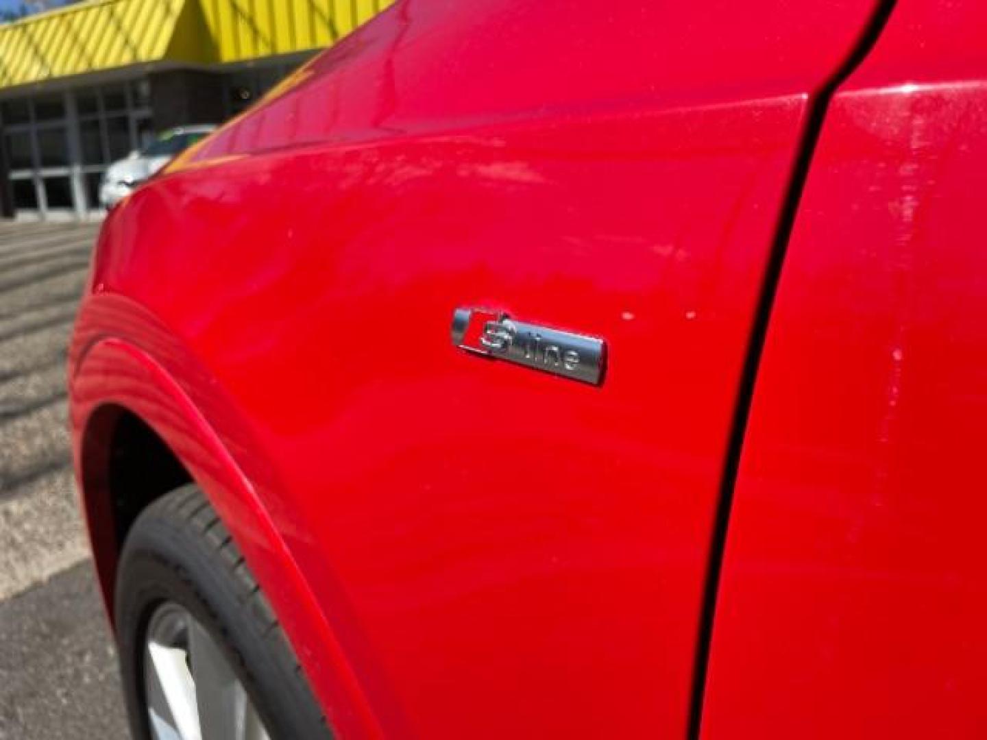 2018 Misano Red Pearl Effect Audi Q3 2.0T Premium (WA1JCCFSXJR) with an 2L I-4 gasoline direct injection engine, located at 745 S Robert St, St. Paul, MN, 55107, (651) 222-2991, 44.923389, -93.081215 - Photo#2