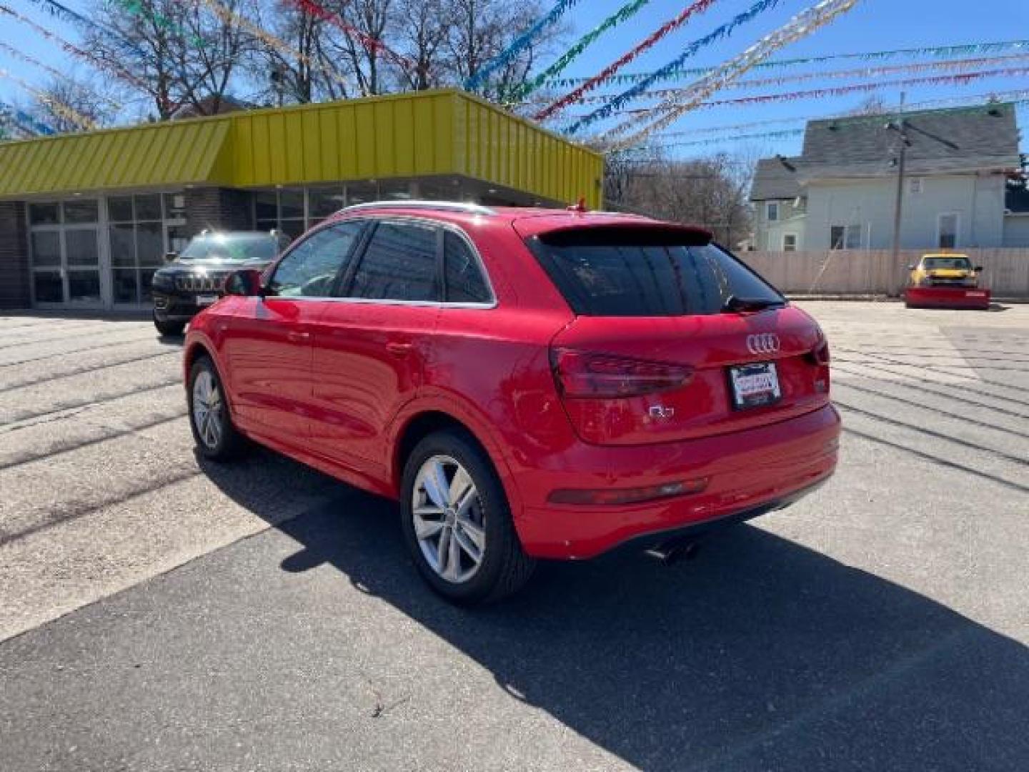 2018 Misano Red Pearl Effect Audi Q3 2.0T Premium (WA1JCCFSXJR) with an 2L I-4 gasoline direct injection engine, located at 745 S Robert St, St. Paul, MN, 55107, (651) 222-2991, 44.923389, -93.081215 - Photo#3