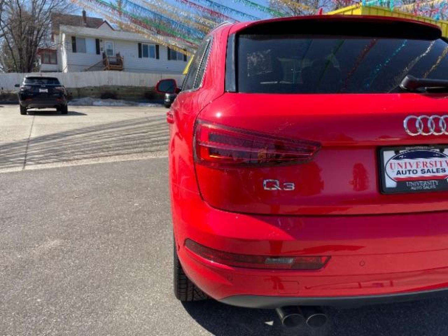 2018 Misano Red Pearl Effect Audi Q3 2.0T Premium (WA1JCCFSXJR) with an 2L I-4 gasoline direct injection engine, located at 745 S Robert St, St. Paul, MN, 55107, (651) 222-2991, 44.923389, -93.081215 - Photo#4