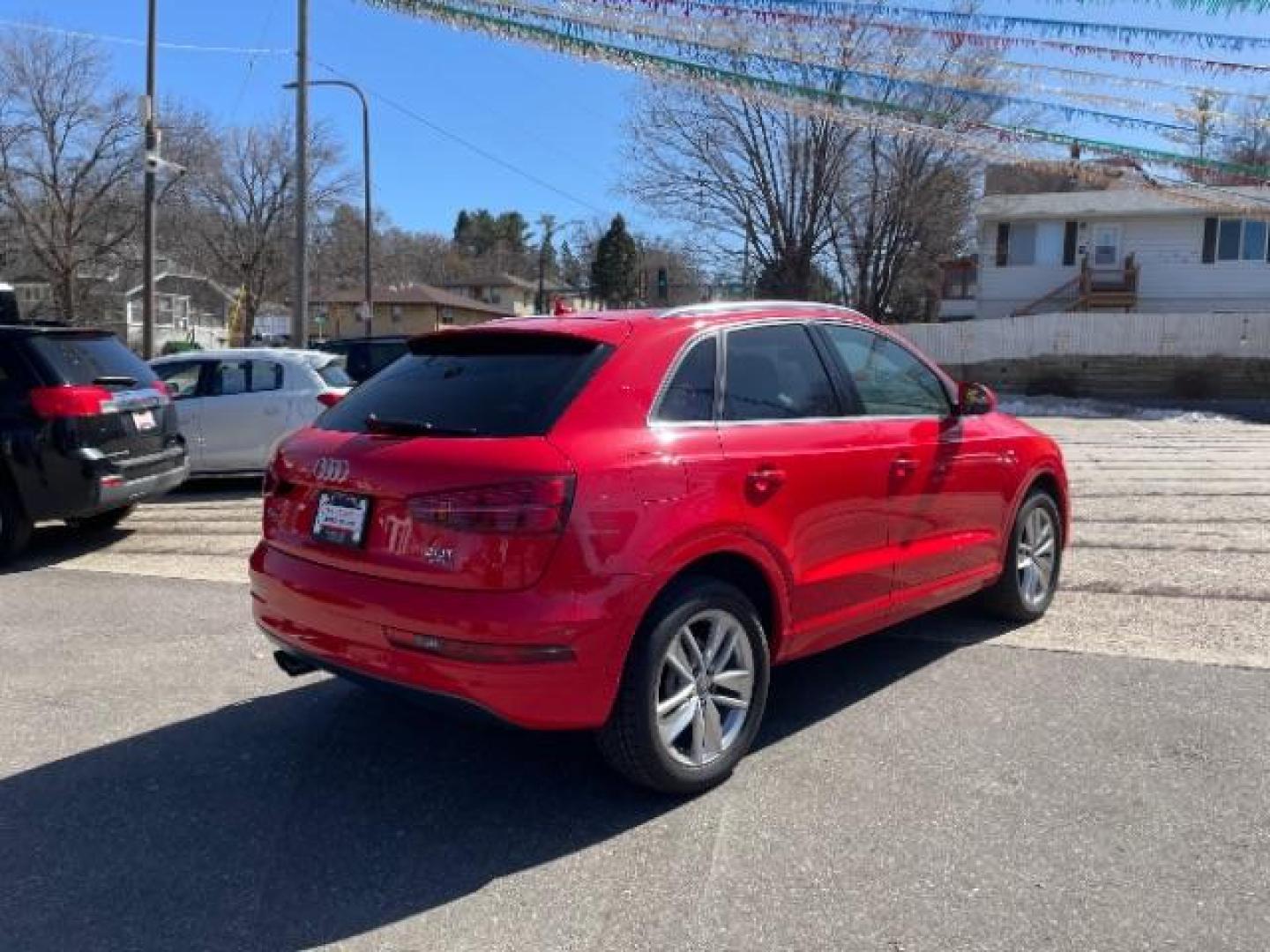 2018 Misano Red Pearl Effect Audi Q3 2.0T Premium (WA1JCCFSXJR) with an 2L I-4 gasoline direct injection engine, located at 745 S Robert St, St. Paul, MN, 55107, (651) 222-2991, 44.923389, -93.081215 - Photo#7
