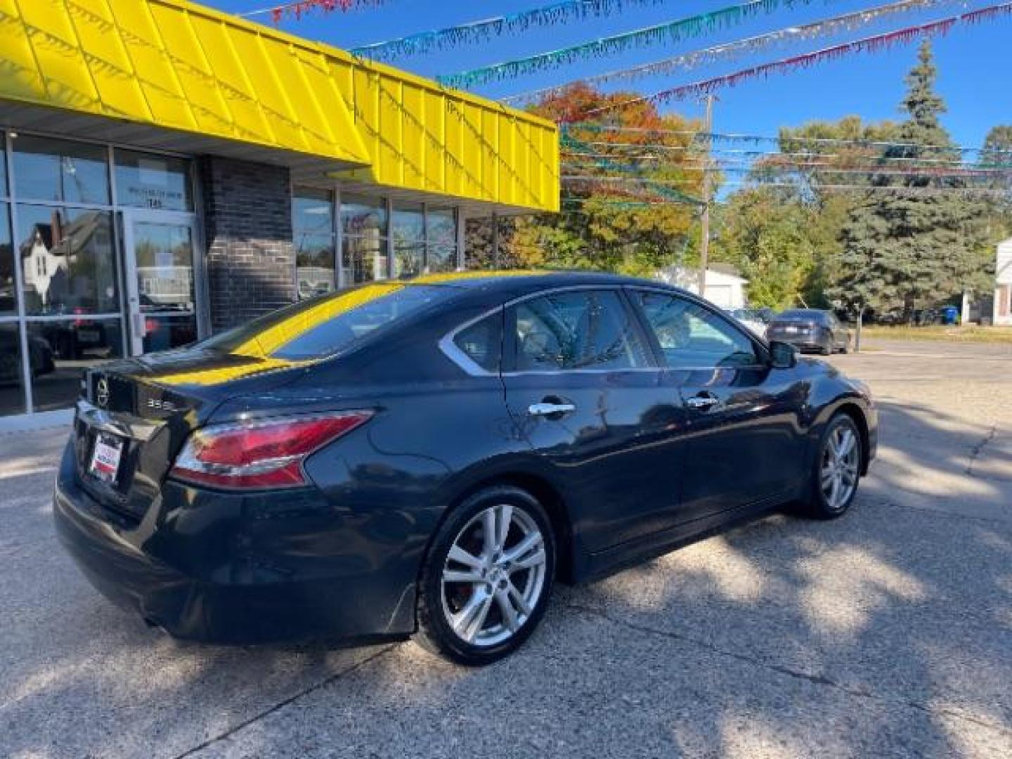 2014 Storm Blue Metallic Nissan Altima 3.5 SL (1N4BL3AP3EC) with an 3.5L V6 DOHC 24V engine, Continuously Variabl transmission, located at 745 S Robert St, St. Paul, MN, 55107, (651) 222-2991, 44.923389, -93.081215 - Photo#4