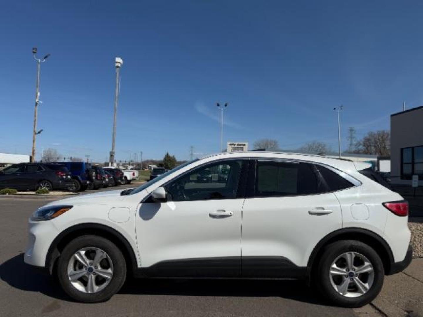 2021 Oxford White Ford Escape SE Plug-In Hybrid (1FMCU0EZ6MU) with an Duratec 2.5L I-4 DOHC engine, located at 745 S Robert St, St. Paul, MN, 55107, (651) 222-2991, 44.923389, -93.081215 - Photo#1
