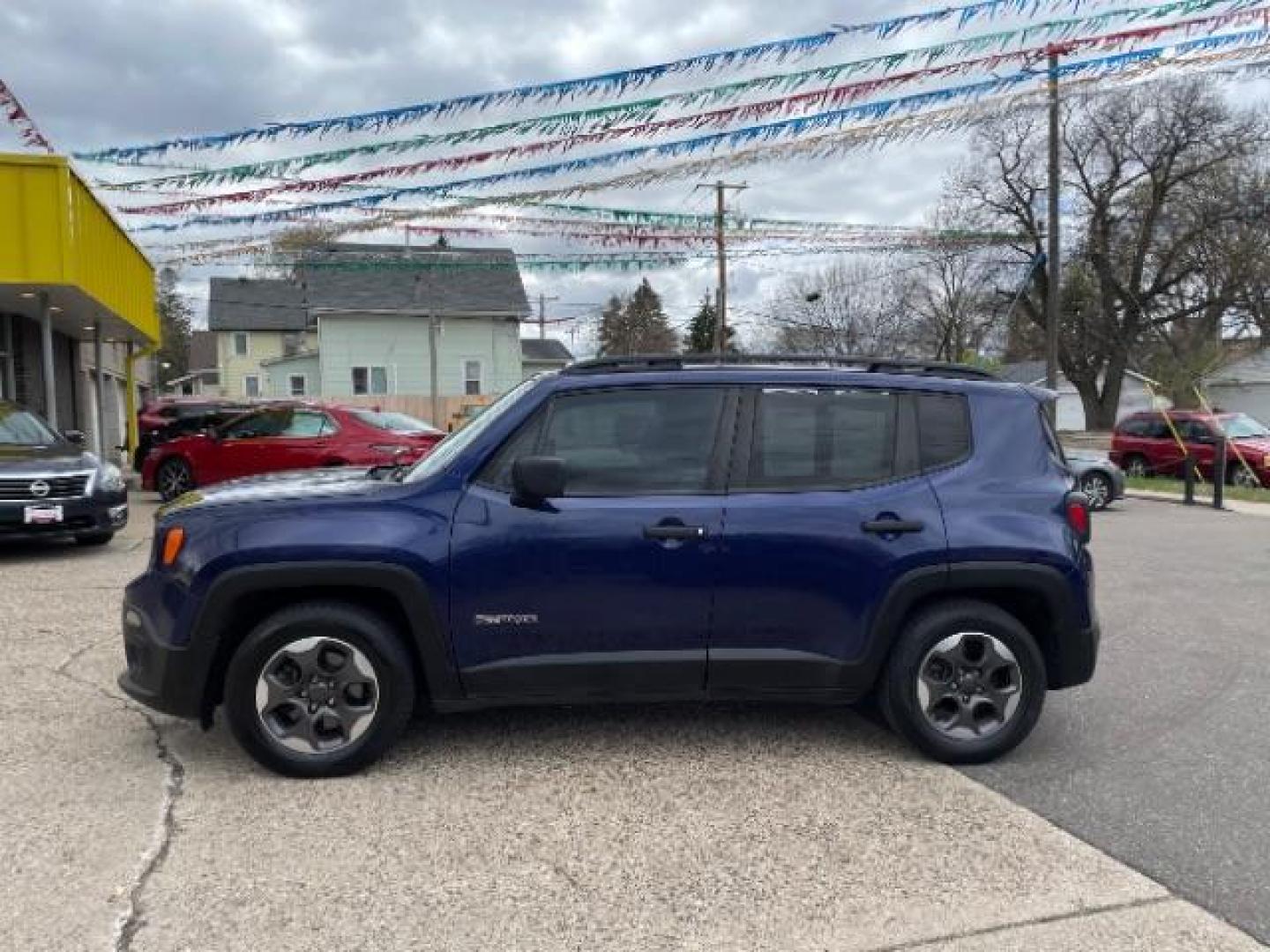 2016 Jetset Blue /Sandstorm/Black Jeep Renegade Sport (ZACCJAAW5GP) with an MultiAir 1.4L I-4 variable valve control engine, 6-Speed Manual transmission, located at 745 S Robert St, St. Paul, MN, 55107, (651) 222-2991, 44.923389, -93.081215 - Photo#3