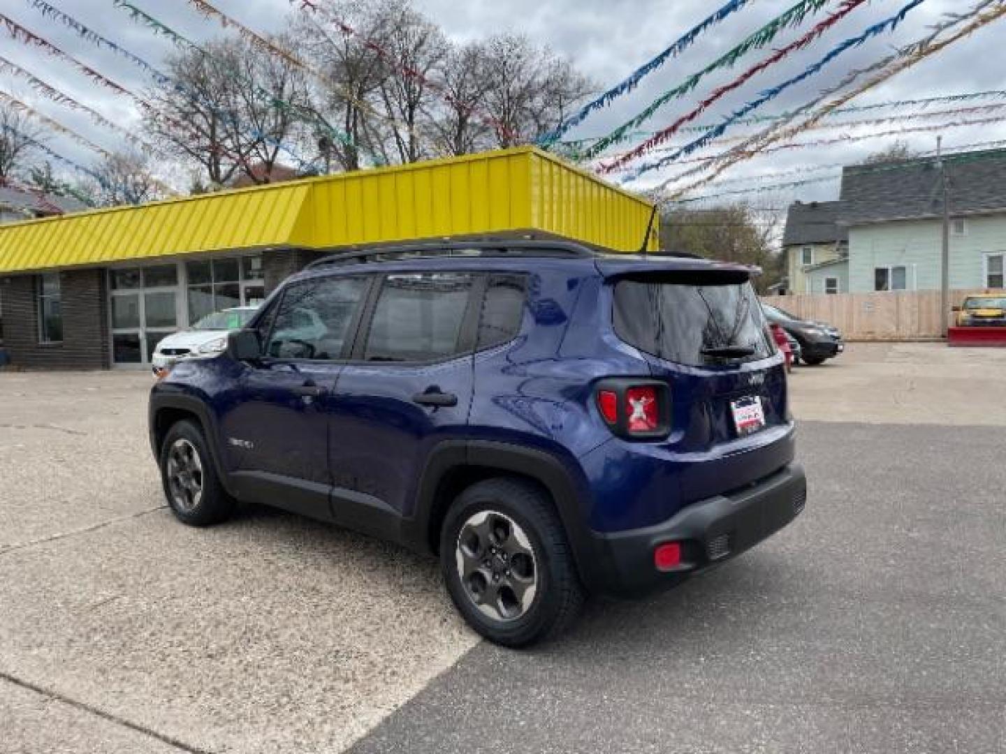 2016 Jetset Blue /Sandstorm/Black Jeep Renegade Sport (ZACCJAAW5GP) with an MultiAir 1.4L I-4 variable valve control engine, 6-Speed Manual transmission, located at 745 S Robert St, St. Paul, MN, 55107, (651) 222-2991, 44.923389, -93.081215 - Photo#4