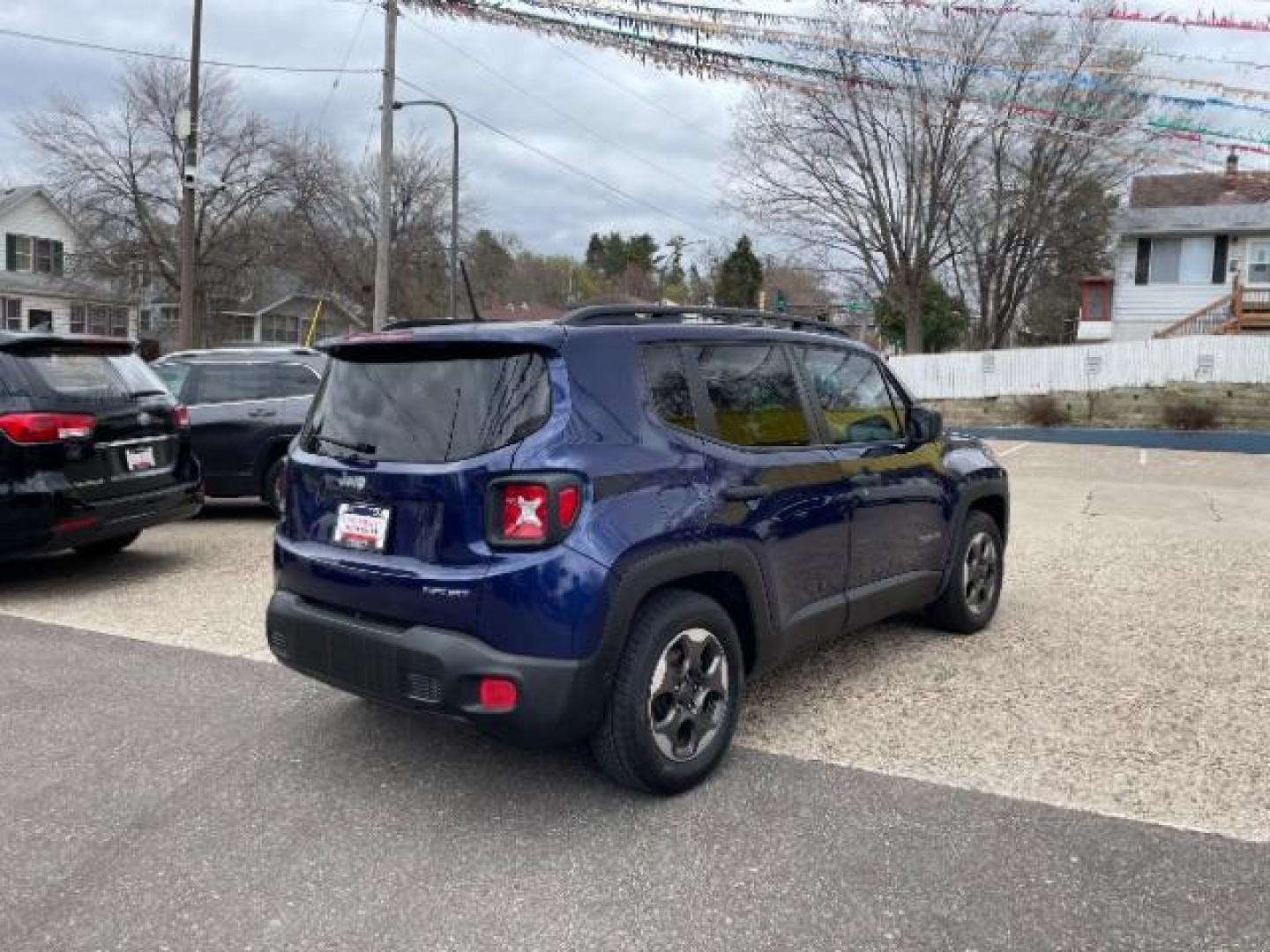 2016 Jetset Blue /Sandstorm/Black Jeep Renegade Sport (ZACCJAAW5GP) with an MultiAir 1.4L I-4 variable valve control engine, 6-Speed Manual transmission, located at 745 S Robert St, St. Paul, MN, 55107, (651) 222-2991, 44.923389, -93.081215 - Photo#6