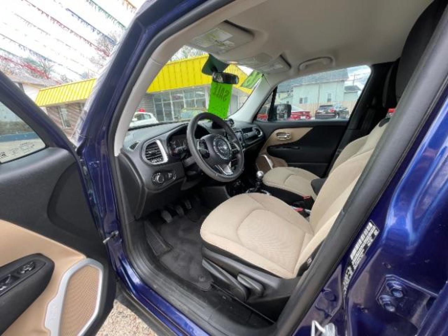 2016 Jetset Blue /Sandstorm/Black Jeep Renegade Sport (ZACCJAAW5GP) with an MultiAir 1.4L I-4 variable valve control engine, 6-Speed Manual transmission, located at 745 S Robert St, St. Paul, MN, 55107, (651) 222-2991, 44.923389, -93.081215 - Photo#9