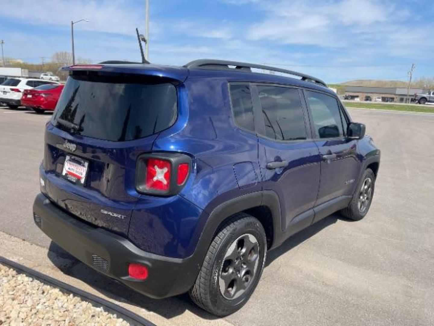 2016 Jetset Blue /Sandstorm/Black Jeep Renegade Sport (ZACCJAAW5GP) with an MultiAir 1.4L I-4 variable valve control engine, 6-Speed Manual transmission, located at 745 S Robert St, St. Paul, MN, 55107, (651) 222-2991, 44.923389, -93.081215 - Photo#4