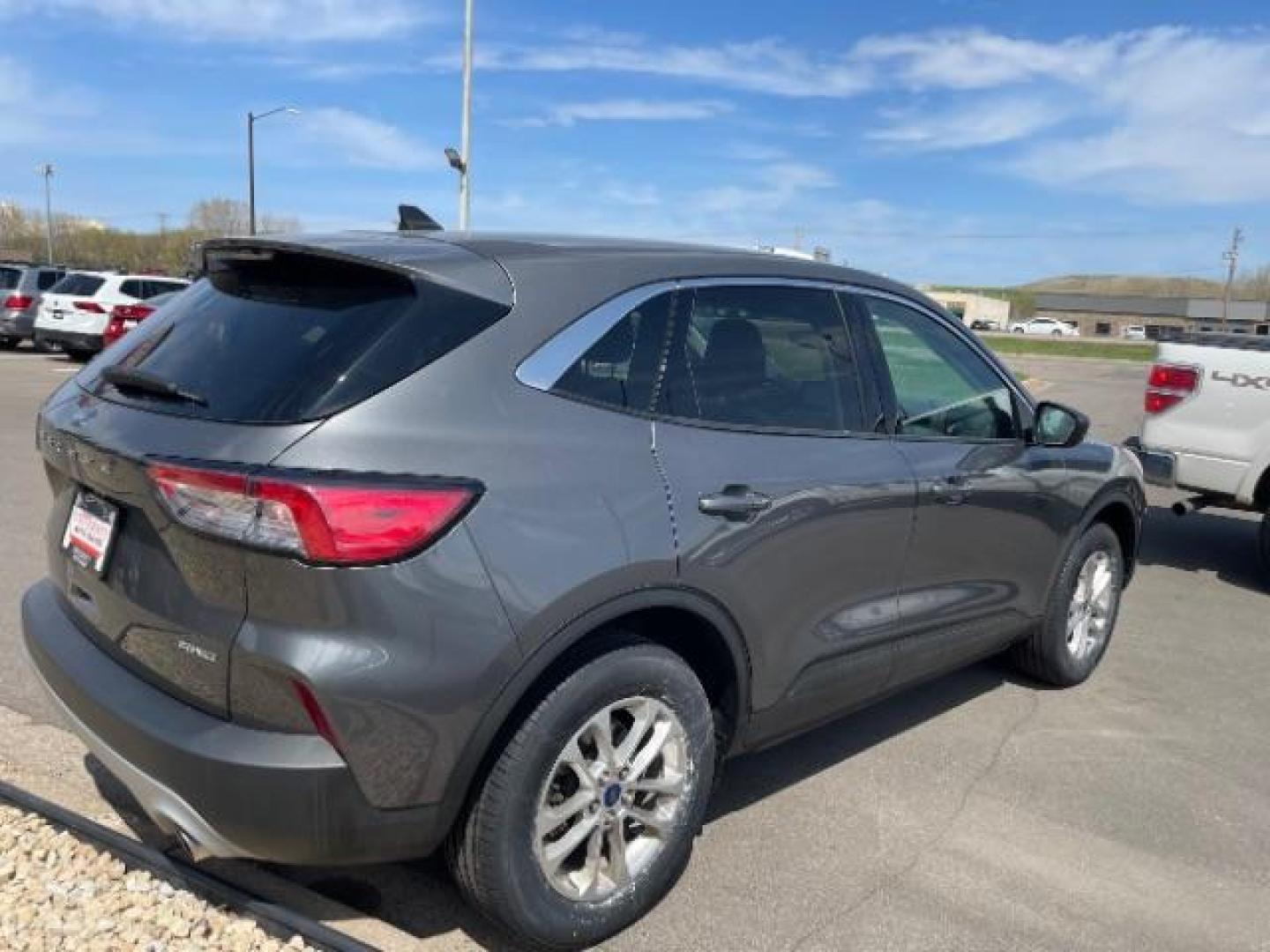 2022 Carbonized Gray Metallic Ford Escape SE (1FMCU9G61NU) with an EcoBoost 1.5L I-3 port/direct injection engine, located at 3301 W Hwy 13, Burnsville, MN, 55337, (952) 460-3200, 44.775333, -93.320808 - Photo#4