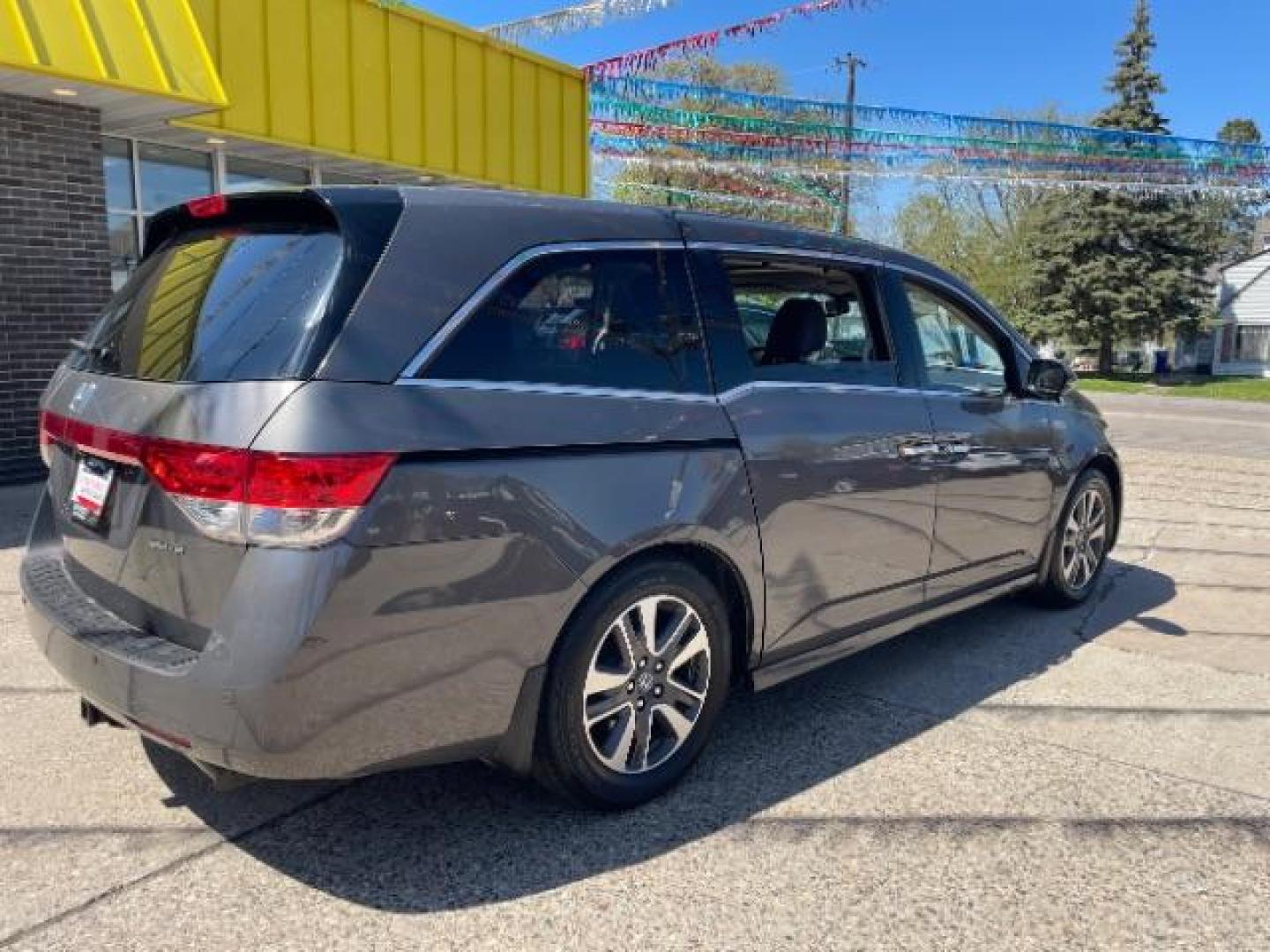 2015 Modern Steel Metallic Honda Odyssey Touring Elite | Touring (5FNRL5H90FB) with an 3.5L V-6 i-VTEC variable valve control engine, located at 745 S Robert St, St. Paul, MN, 55107, (651) 222-2991, 44.923389, -93.081215 - Photo#4