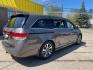 2015 Modern Steel Metallic Honda Odyssey Touring Elite | Touring (5FNRL5H90FB) with an 3.5L V-6 i-VTEC variable valve control engine, located at 745 S Robert St, St. Paul, MN, 55107, (651) 222-2991, 44.923389, -93.081215 - Photo#4