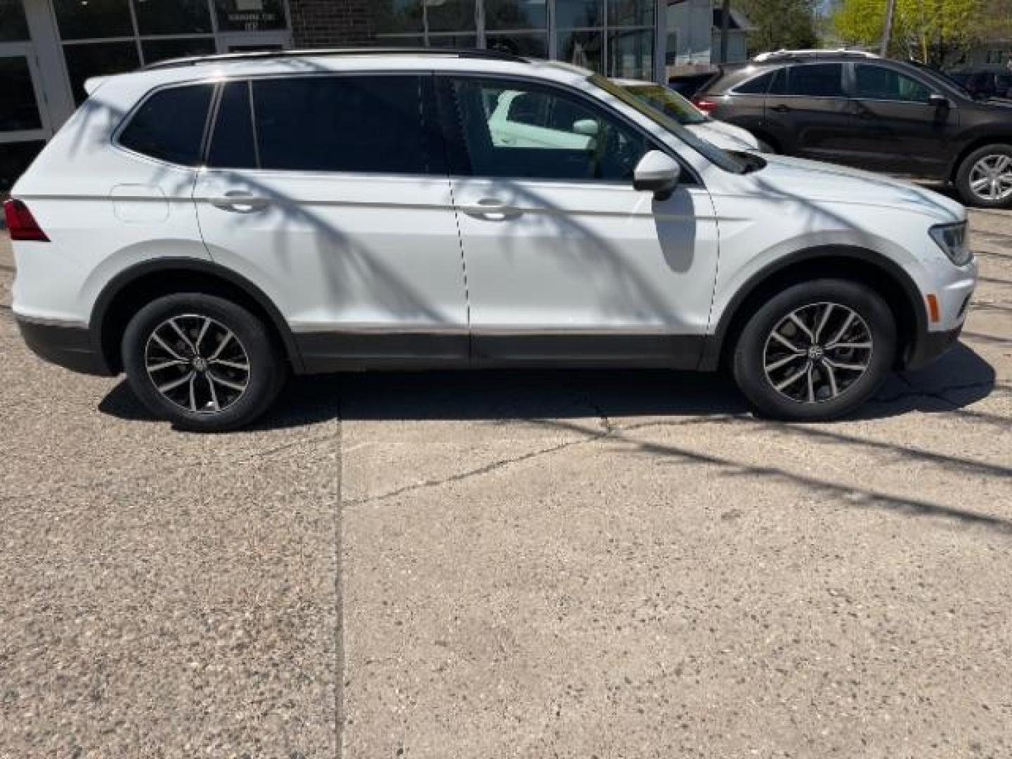2021 Pure White Volkswagen Tiguan 2.0T SE | 2.0T SE R-Line Black | 2.0T SEL (3VV2B7AX5MM) with an 2L I-4 gasoline direct injection engine, located at 3301 W Hwy 13, Burnsville, MN, 55337, (952) 460-3200, 44.775333, -93.320808 - Photo#4