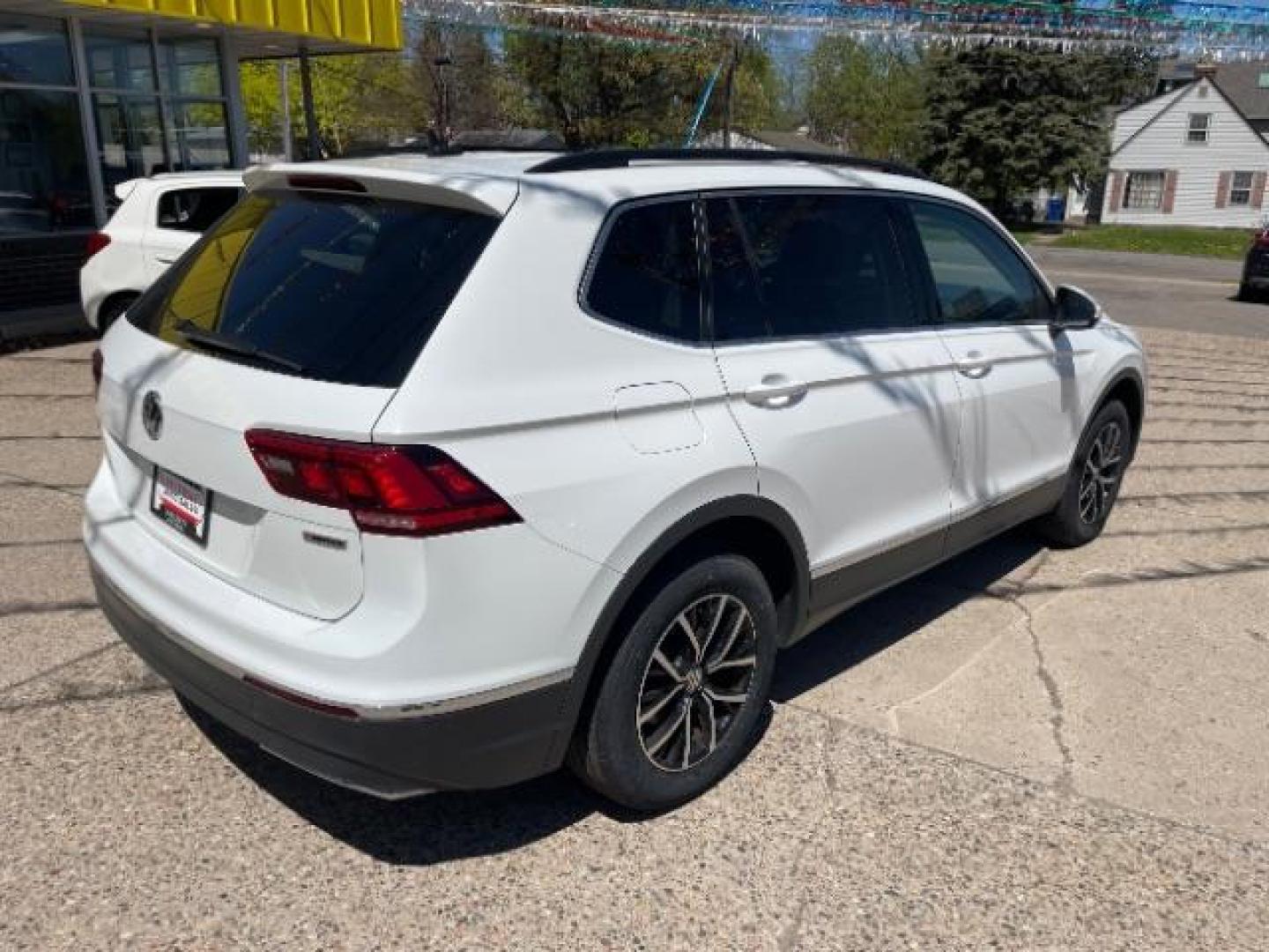 2021 Pure White Volkswagen Tiguan 2.0T SE | 2.0T SE R-Line Black | 2.0T SEL (3VV2B7AX5MM) with an 2L I-4 gasoline direct injection engine, located at 3301 W Hwy 13, Burnsville, MN, 55337, (952) 460-3200, 44.775333, -93.320808 - Photo#5
