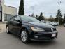 2015 Black Volkswagen Jetta 1.8T SE (3VWD07AJ5FM) with an 1.8L I-4 gasoline direct injection engine, located at 3301 W Hwy 13, Burnsville, MN, 55337, (952) 460-3200, 44.775333, -93.320808 - Photo#5