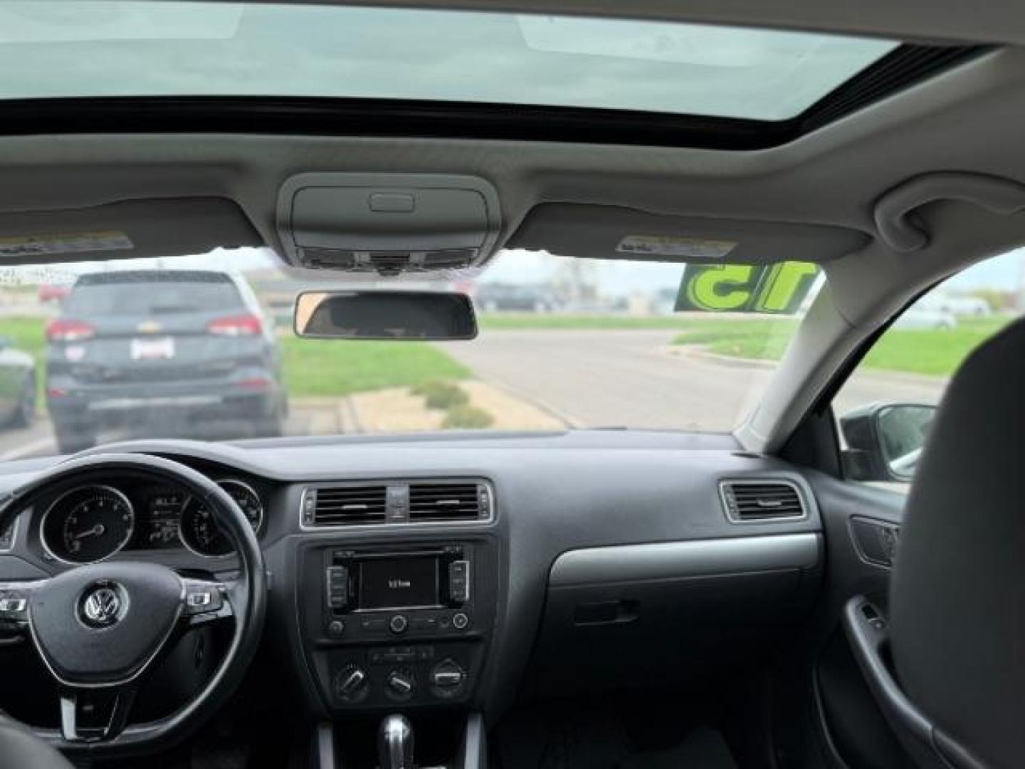 2015 Black Volkswagen Jetta 1.8T SE (3VWD07AJ5FM) with an 1.8L I-4 gasoline direct injection engine, located at 3301 W Hwy 13, Burnsville, MN, 55337, (952) 460-3200, 44.775333, -93.320808 - Photo#7