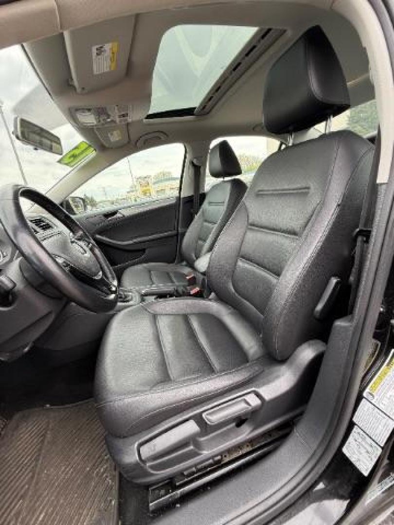 2015 Black Volkswagen Jetta 1.8T SE (3VWD07AJ5FM) with an 1.8L I-4 gasoline direct injection engine, located at 3301 W Hwy 13, Burnsville, MN, 55337, (952) 460-3200, 44.775333, -93.320808 - Photo#17