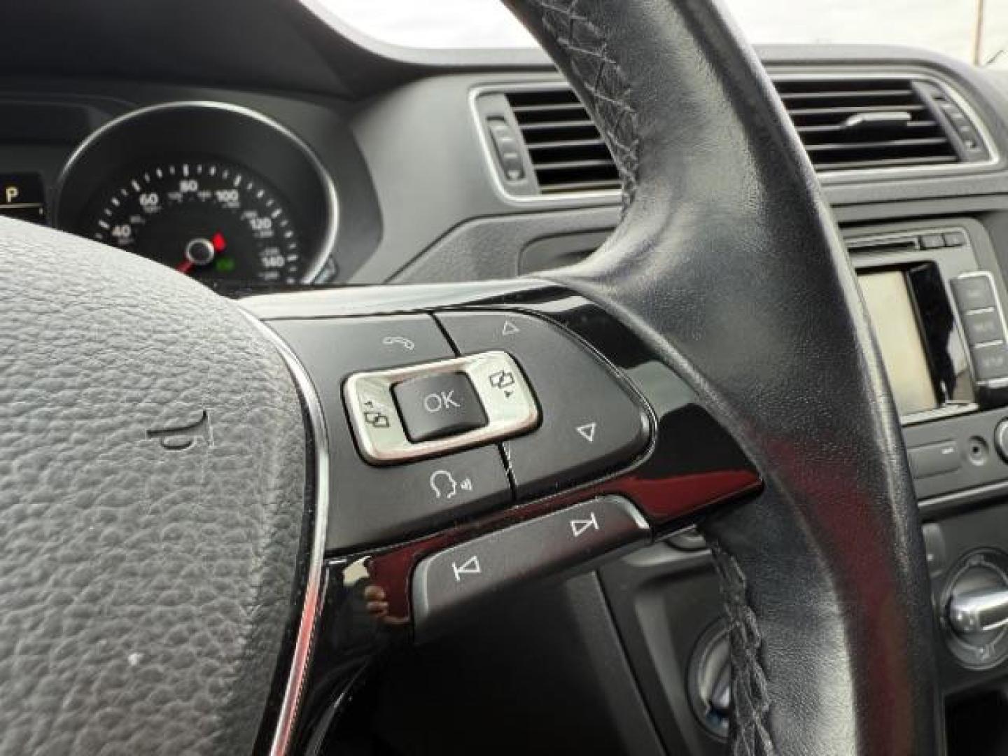 2015 Black Volkswagen Jetta 1.8T SE (3VWD07AJ5FM) with an 1.8L I-4 gasoline direct injection engine, located at 3301 W Hwy 13, Burnsville, MN, 55337, (952) 460-3200, 44.775333, -93.320808 - Photo#19
