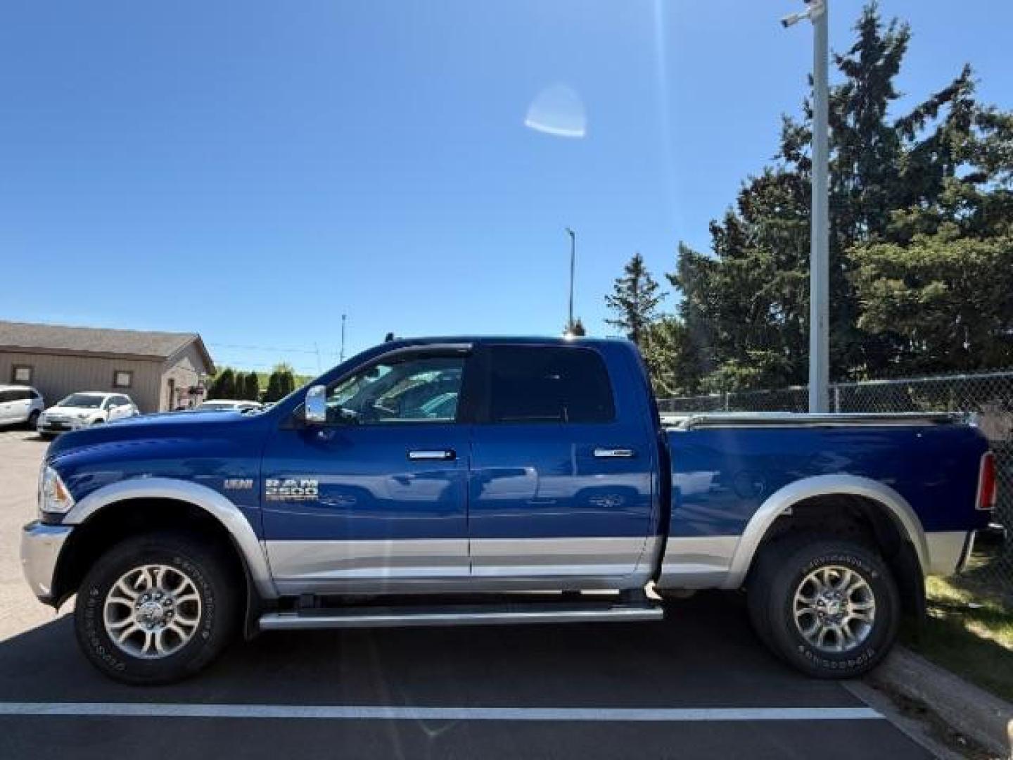 2014 Blue Streak Pearlcoat Ram 2500 Laramie (3C6UR5FJ7EG) , located at 3301 W Hwy 13, Burnsville, MN, 55337, (952) 460-3200, 44.775333, -93.320808 - Photo#1