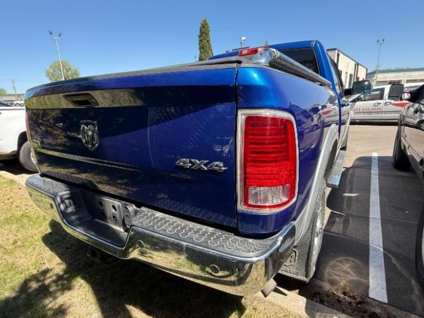 2014 Blue Streak Pearlcoat Ram 2500 Laramie (3C6UR5FJ7EG) , located at 3301 W Hwy 13, Burnsville, MN, 55337, (952) 460-3200, 44.775333, -93.320808 - Photo#4