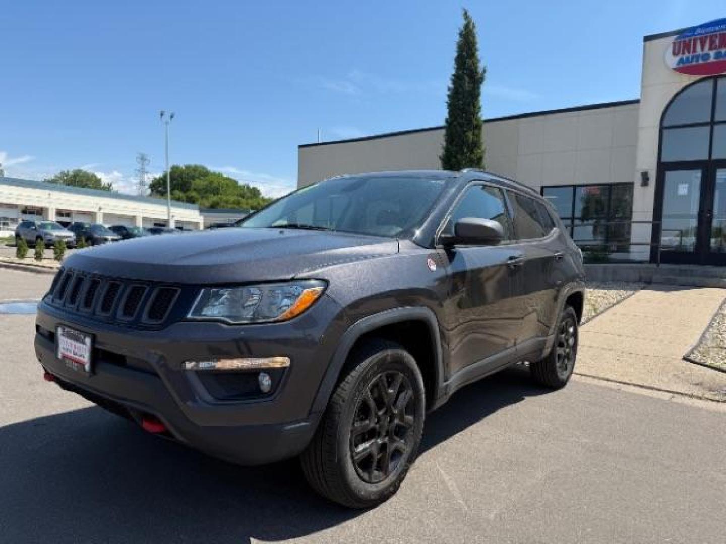2018 Granite Crystal Metallic Clearcoat Jeep Compass Trailhawk 4x4 (3C4NJDDB9JT) with an 2.4L I-4 variable valve control engine, located at 745 S Robert St, St. Paul, MN, 55107, (651) 222-2991, 44.923389, -93.081215 - Photo#0