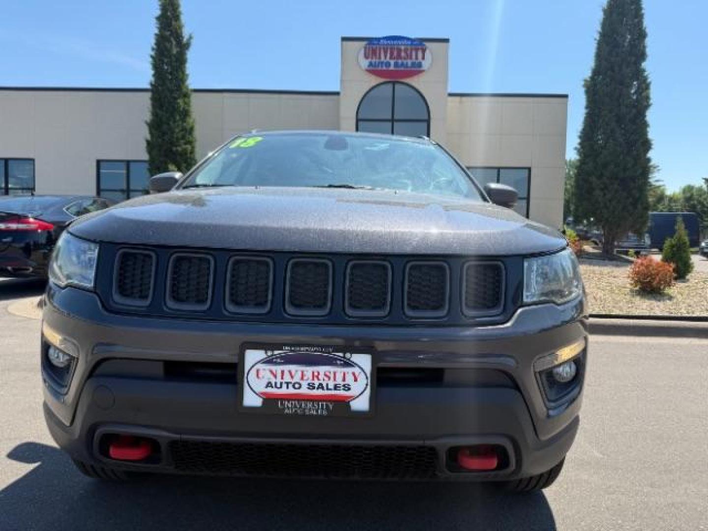 2018 Granite Crystal Metallic Clearcoat Jeep Compass Trailhawk 4x4 (3C4NJDDB9JT) with an 2.4L I-4 variable valve control engine, located at 745 S Robert St, St. Paul, MN, 55107, (651) 222-2991, 44.923389, -93.081215 - Photo#1