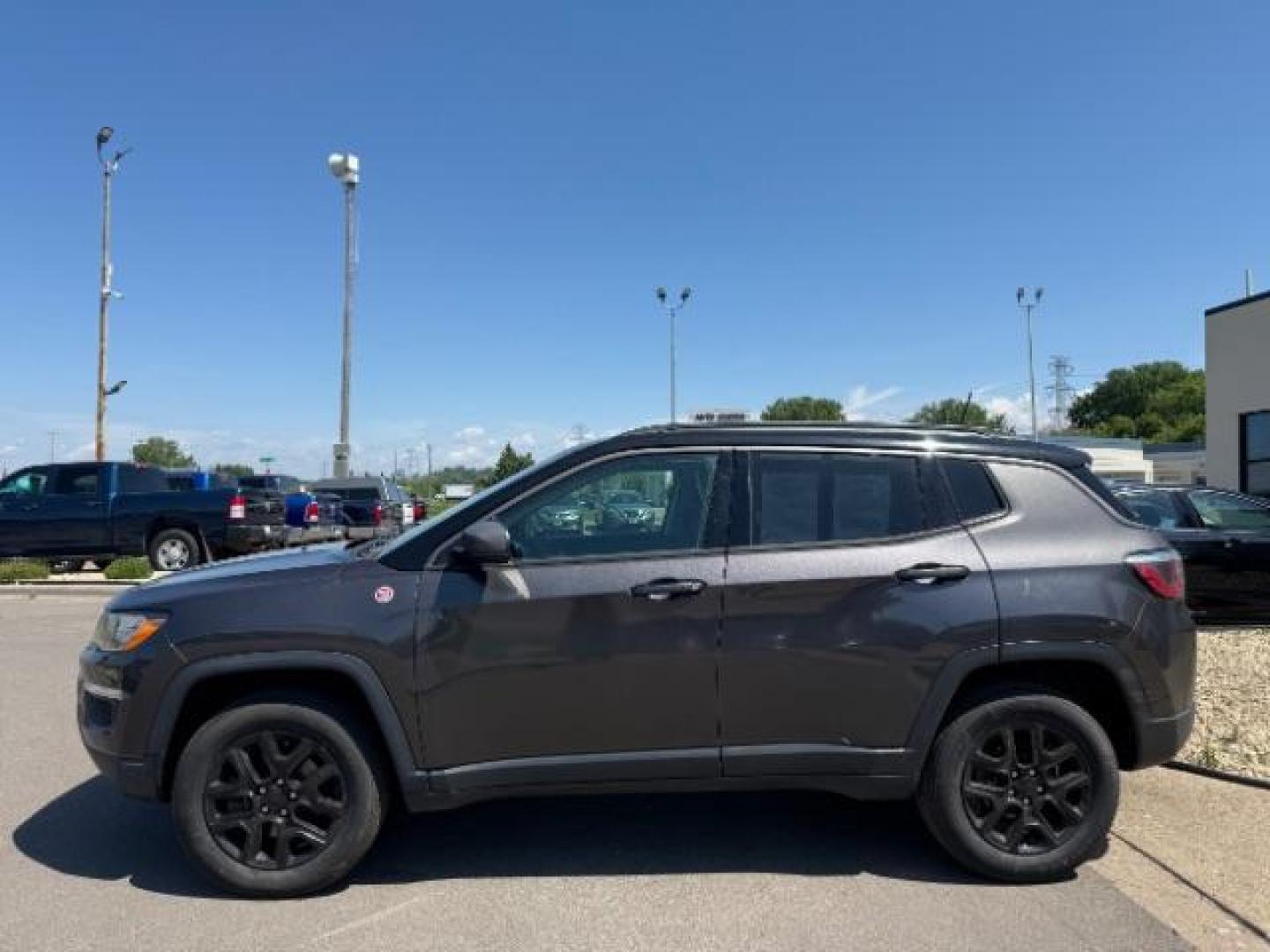 2018 Granite Crystal Metallic Clearcoat Jeep Compass Trailhawk 4x4 (3C4NJDDB9JT) with an 2.4L I-4 variable valve control engine, located at 745 S Robert St, St. Paul, MN, 55107, (651) 222-2991, 44.923389, -93.081215 - Photo#2