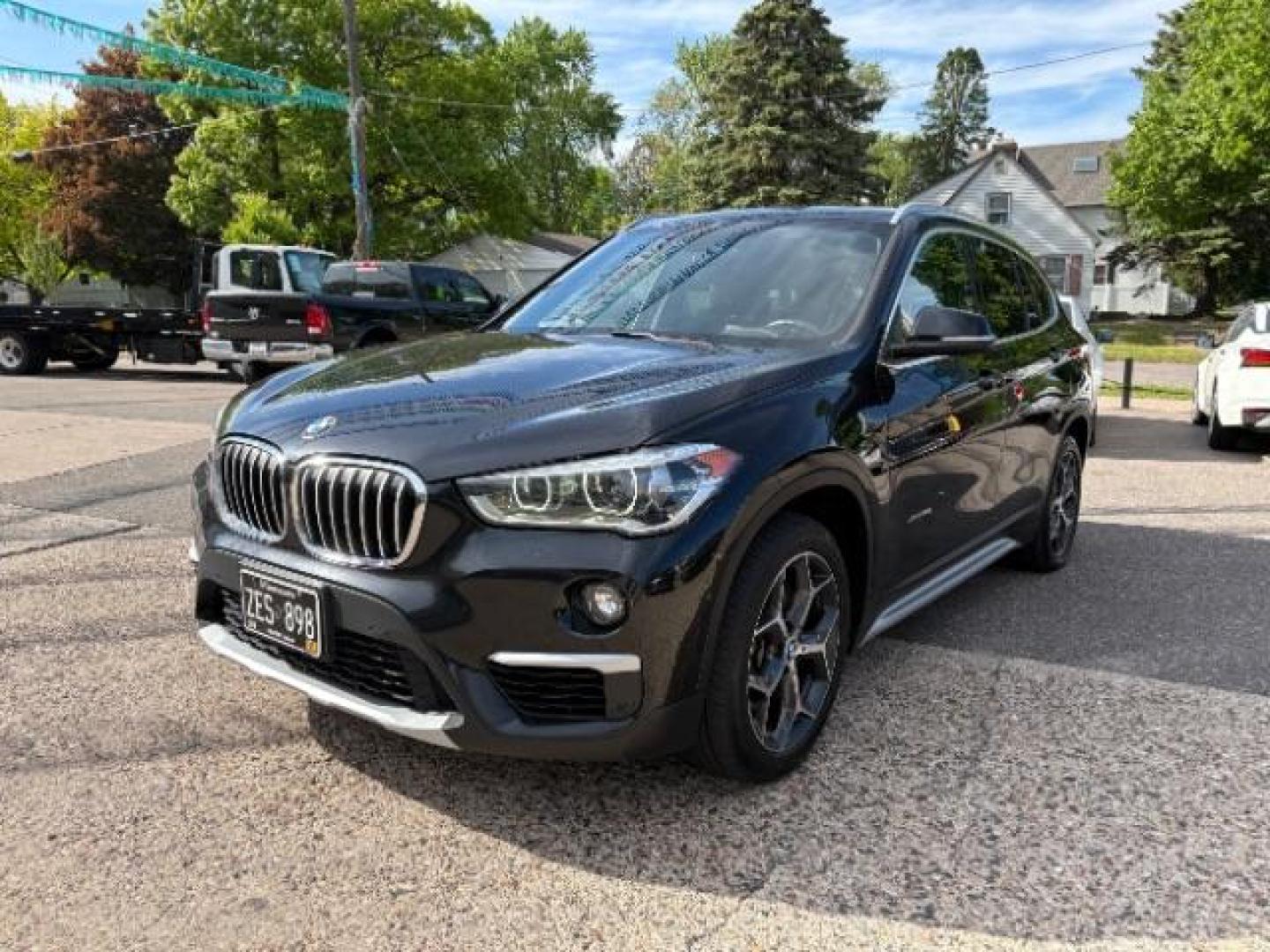2016 Jet Black BMW X1 xDrive28i (WBXHT3C3XGP) with an 2L I-4 gasoline dire engine, located at 745 S Robert St, St. Paul, MN, 55107, (651) 222-2991, 44.923389, -93.081215 - Photo#2