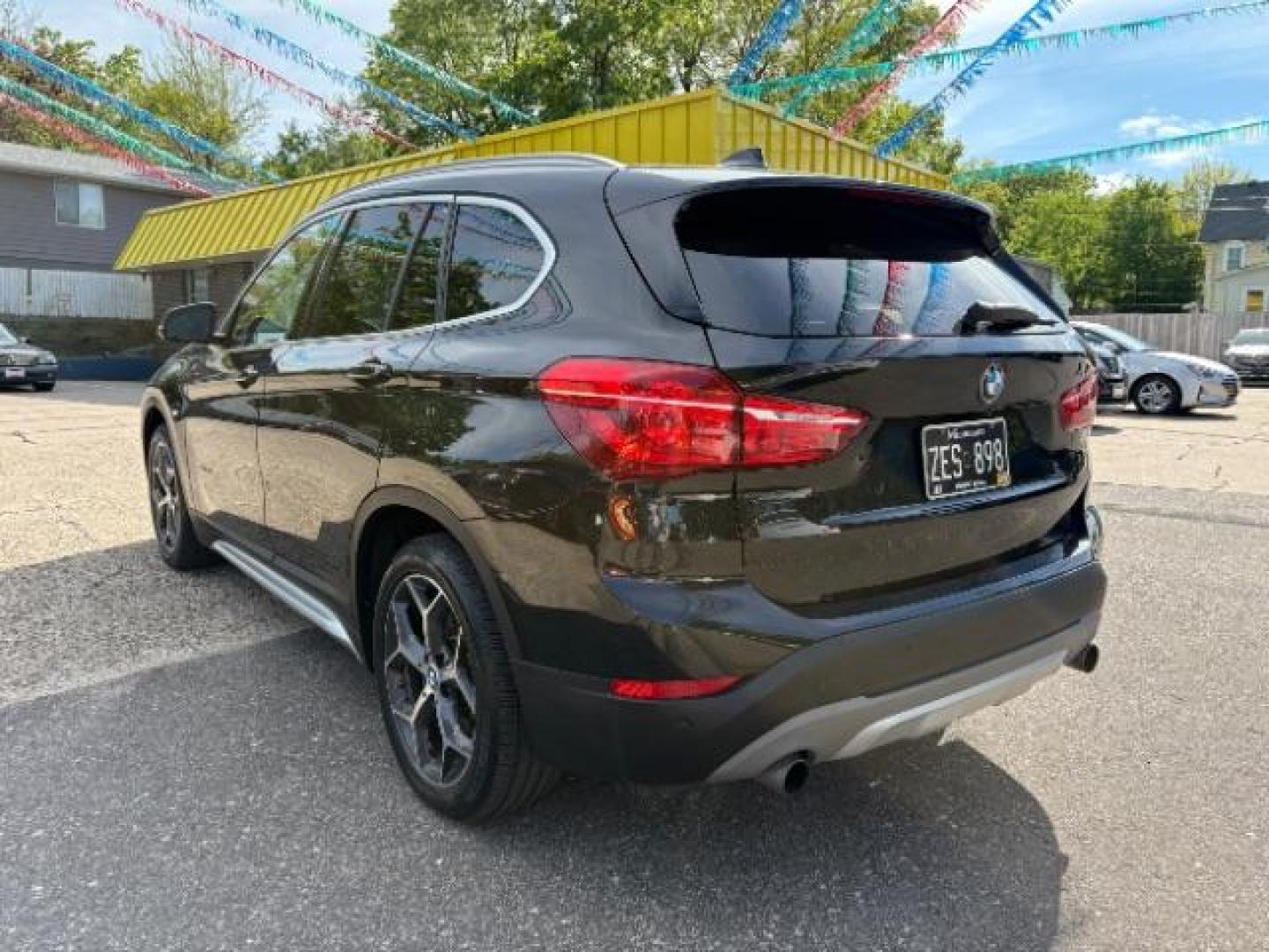 2016 Jet Black BMW X1 xDrive28i (WBXHT3C3XGP) with an 2L I-4 gasoline dire engine, located at 745 S Robert St, St. Paul, MN, 55107, (651) 222-2991, 44.923389, -93.081215 - Photo#4