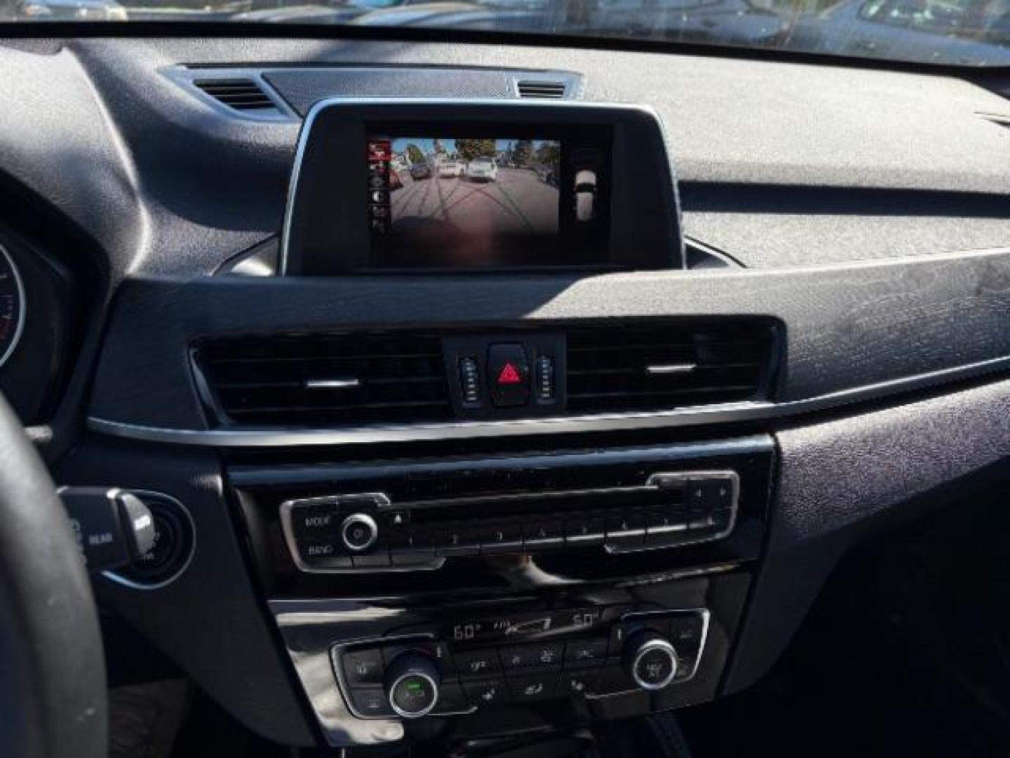 2016 Jet Black BMW X1 xDrive28i (WBXHT3C3XGP) with an 2L I-4 gasoline dire engine, located at 745 S Robert St, St. Paul, MN, 55107, (651) 222-2991, 44.923389, -93.081215 - Photo#9