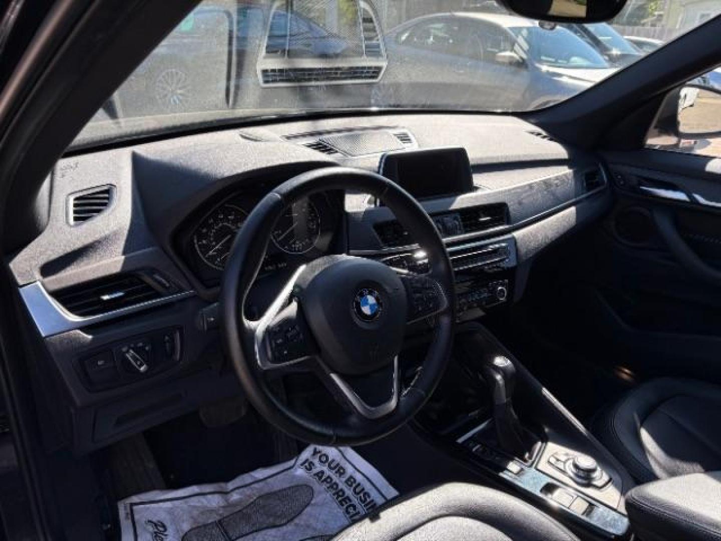 2016 Jet Black BMW X1 xDrive28i (WBXHT3C3XGP) with an 2L I-4 gasoline dire engine, located at 745 S Robert St, St. Paul, MN, 55107, (651) 222-2991, 44.923389, -93.081215 - Photo#10