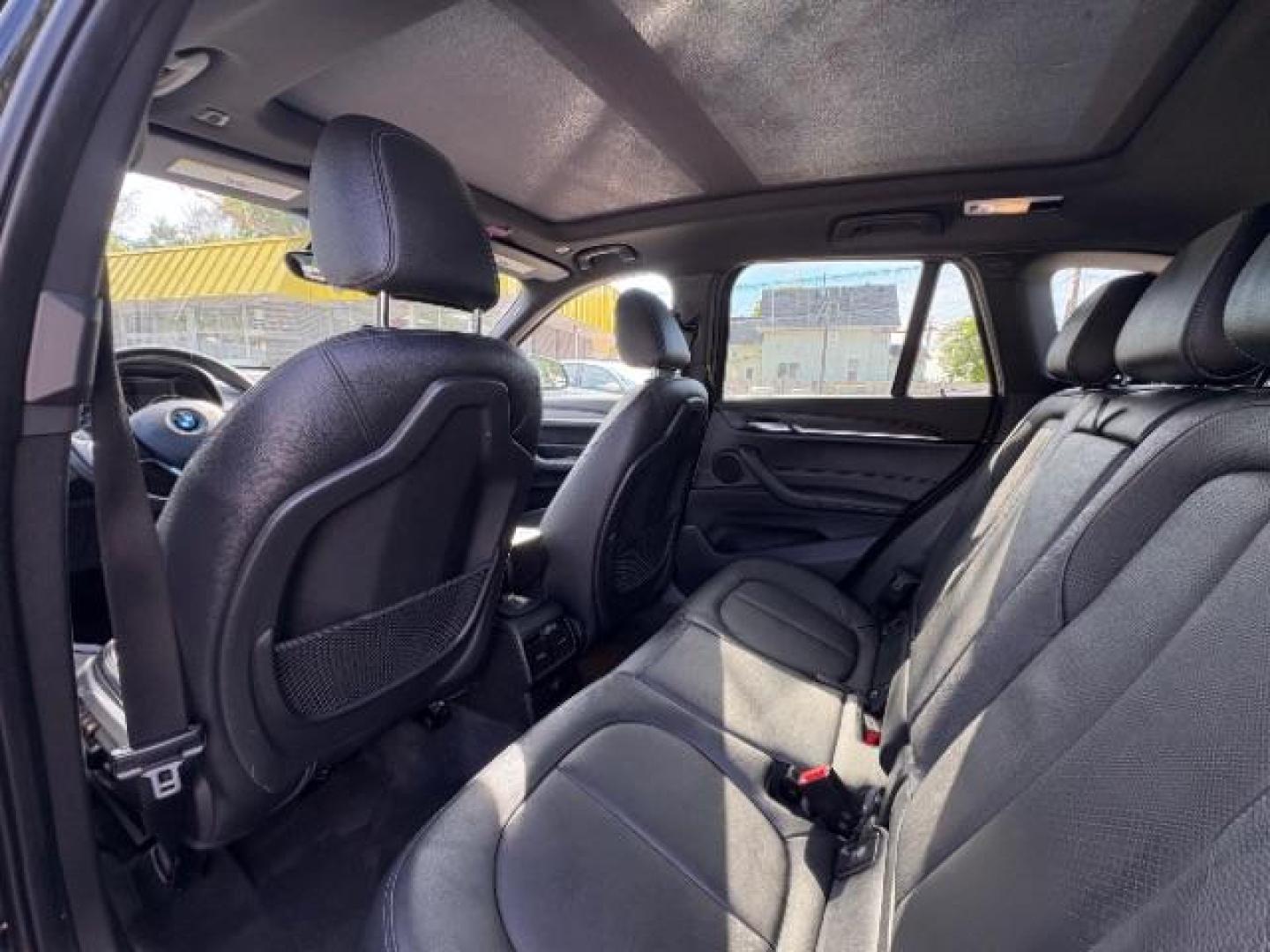 2016 Jet Black BMW X1 xDrive28i (WBXHT3C3XGP) with an 2L I-4 gasoline dire engine, located at 745 S Robert St, St. Paul, MN, 55107, (651) 222-2991, 44.923389, -93.081215 - Photo#16
