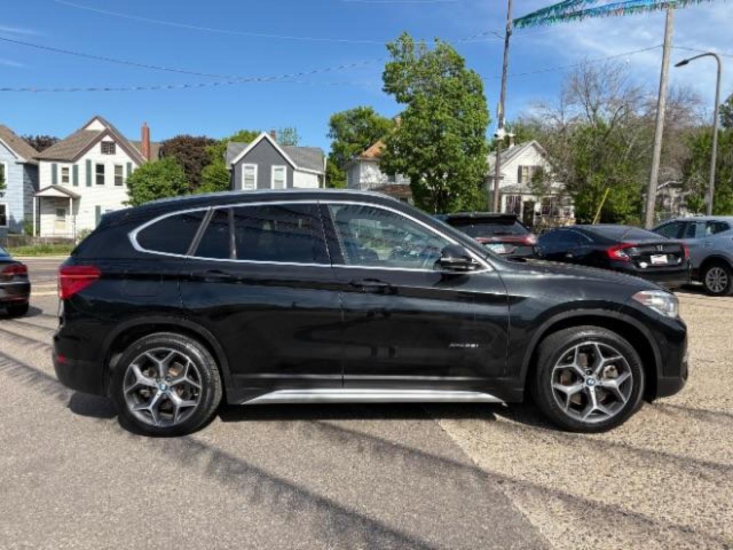2016 Jet Black BMW X1 xDrive28i (WBXHT3C3XGP) with an 2L I-4 gasoline dire engine, located at 745 S Robert St, St. Paul, MN, 55107, (651) 222-2991, 44.923389, -93.081215 - Photo#17